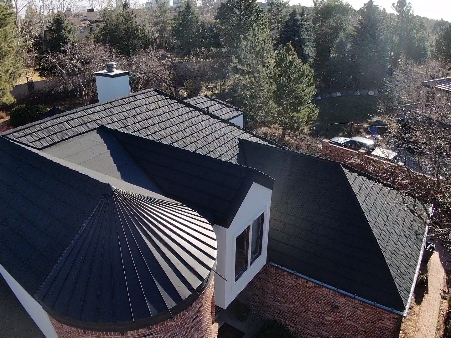 Unified Stone Coated Roof & Stucco Remodle by Blue Peaks Roofing LLC