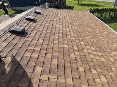 Storm-Damaged Roof & Gutter Replacement