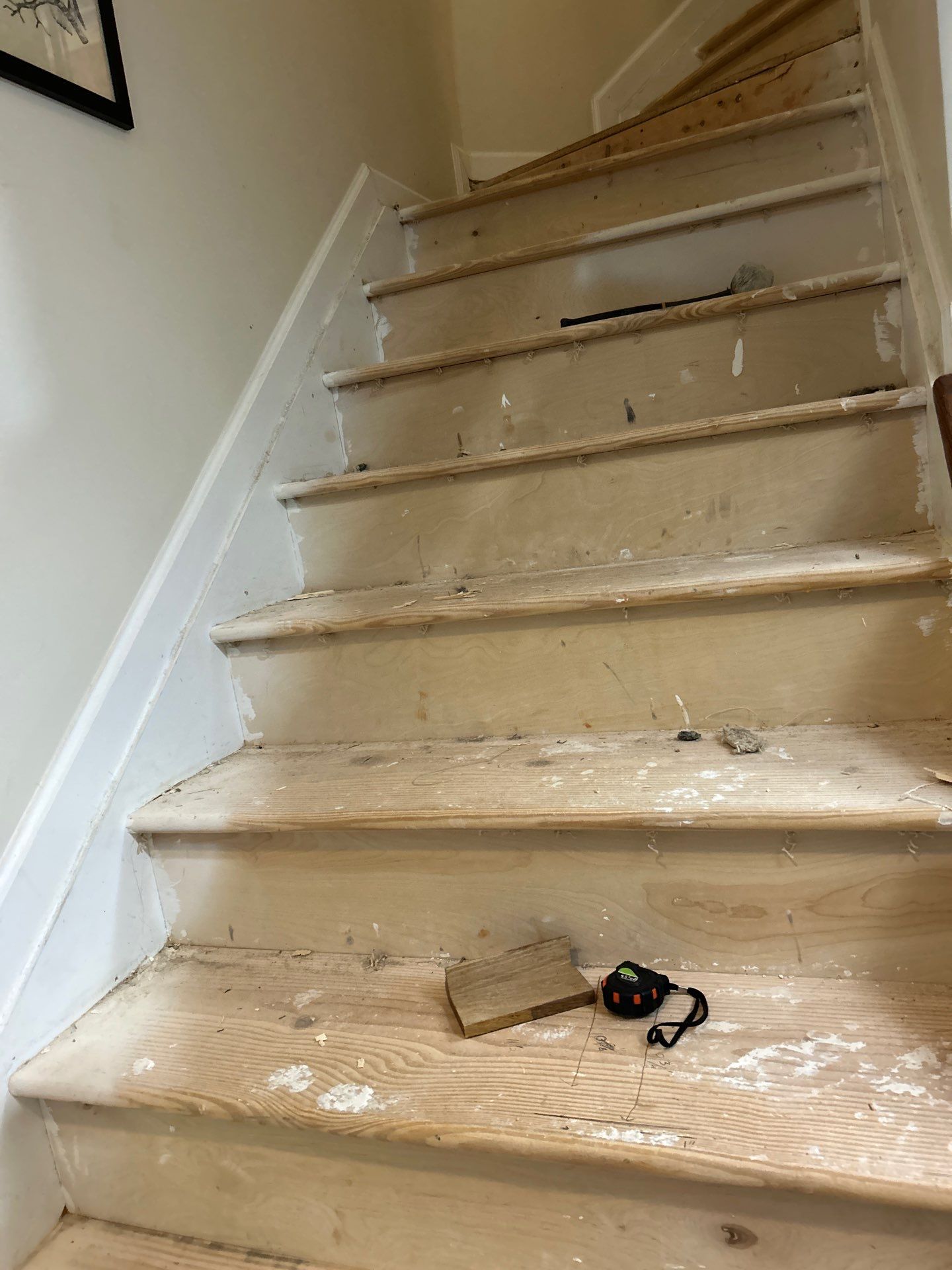 UPGRADE to solid oak stair treads by Footprints Floors of East Atlanta