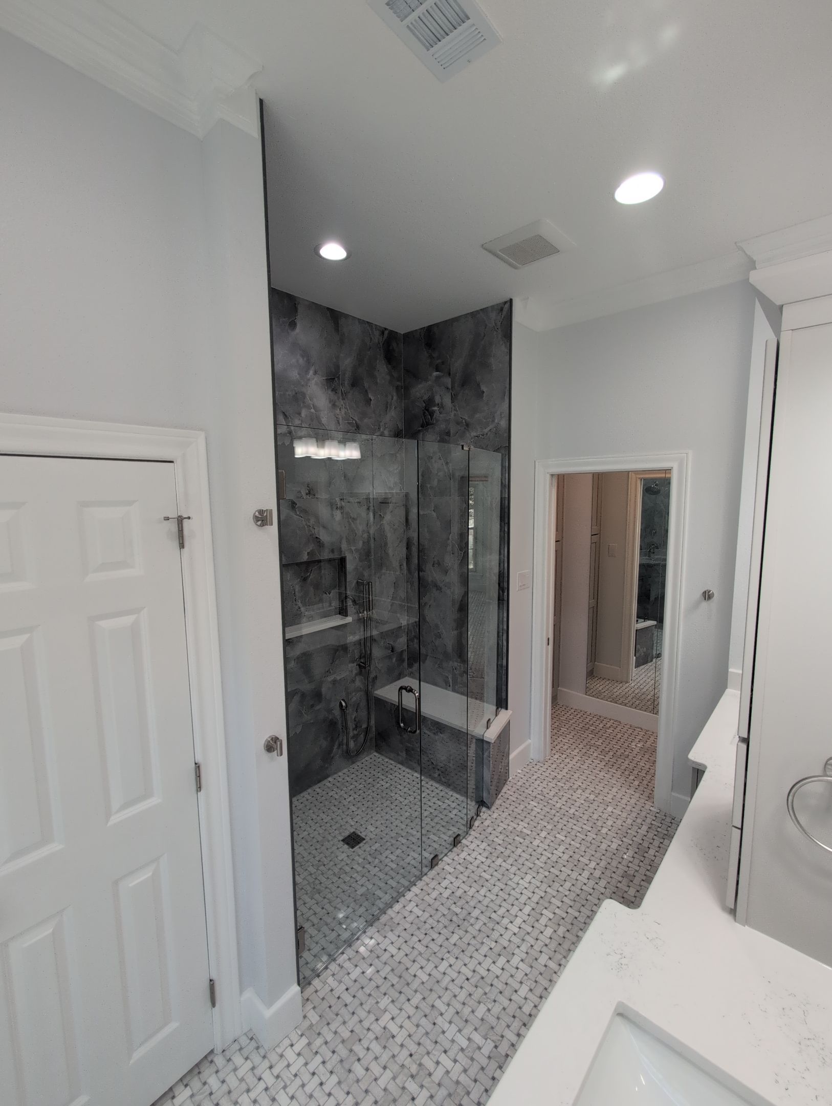 Walker Ranch Bathroom Remodel with Expanded Walk-In Shower and Custom Storage by Legacy Bath and Kitchen 