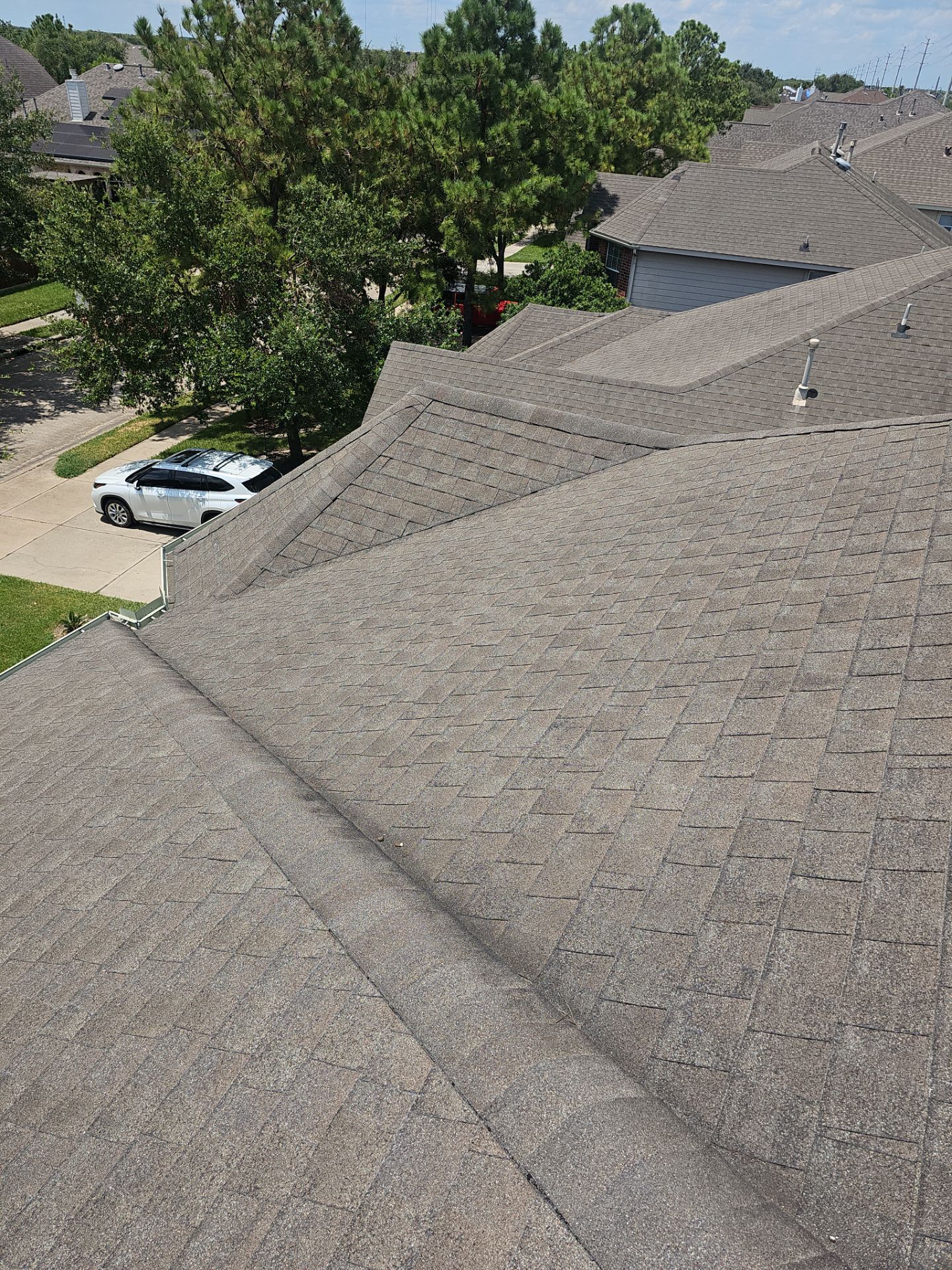 Hail Damage using Owen's Corning Duration (Lifetime) Shingles by Roof Repair Company