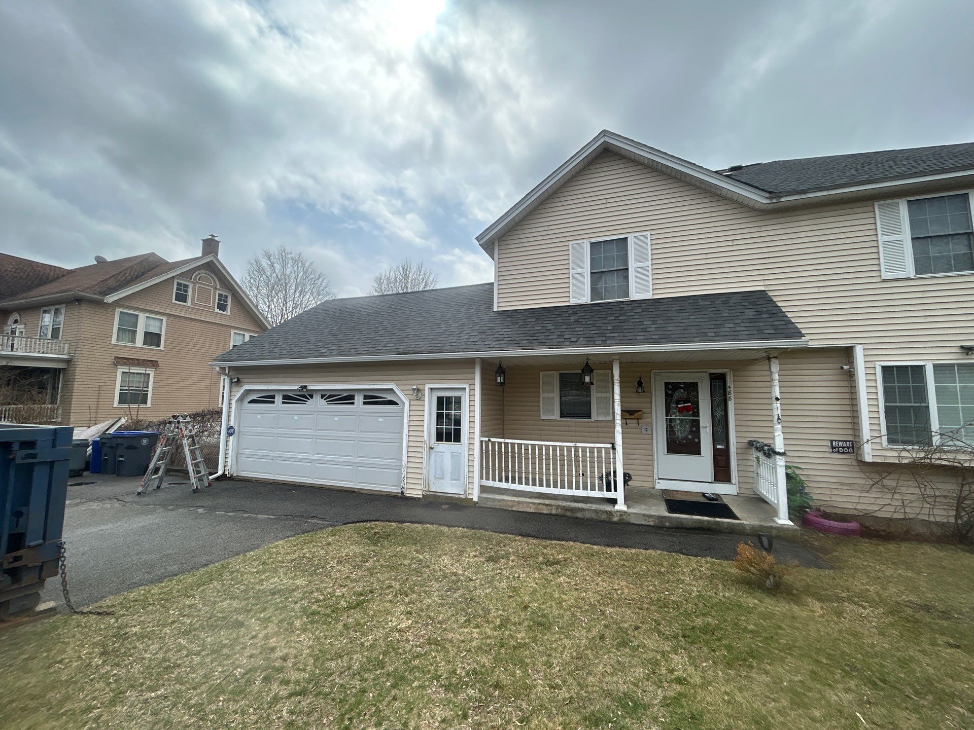 Full Roof Replacement + Seamless Gutters by Mighty Dog Roofing of Greater Middlesex County