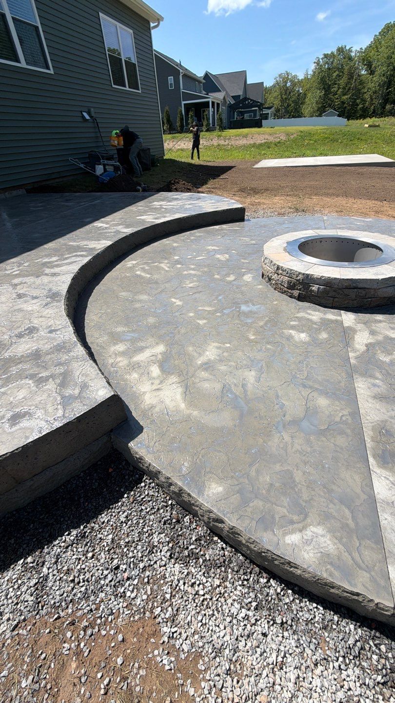 Oxford Slate Patio with Fire Pit by NG Masonry & Construction LLC