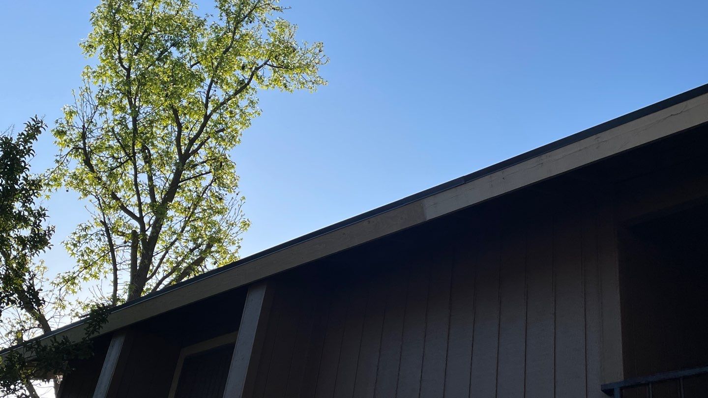 Removed tile from roof and replaced with shingles by Straight Edge Roofing Inc