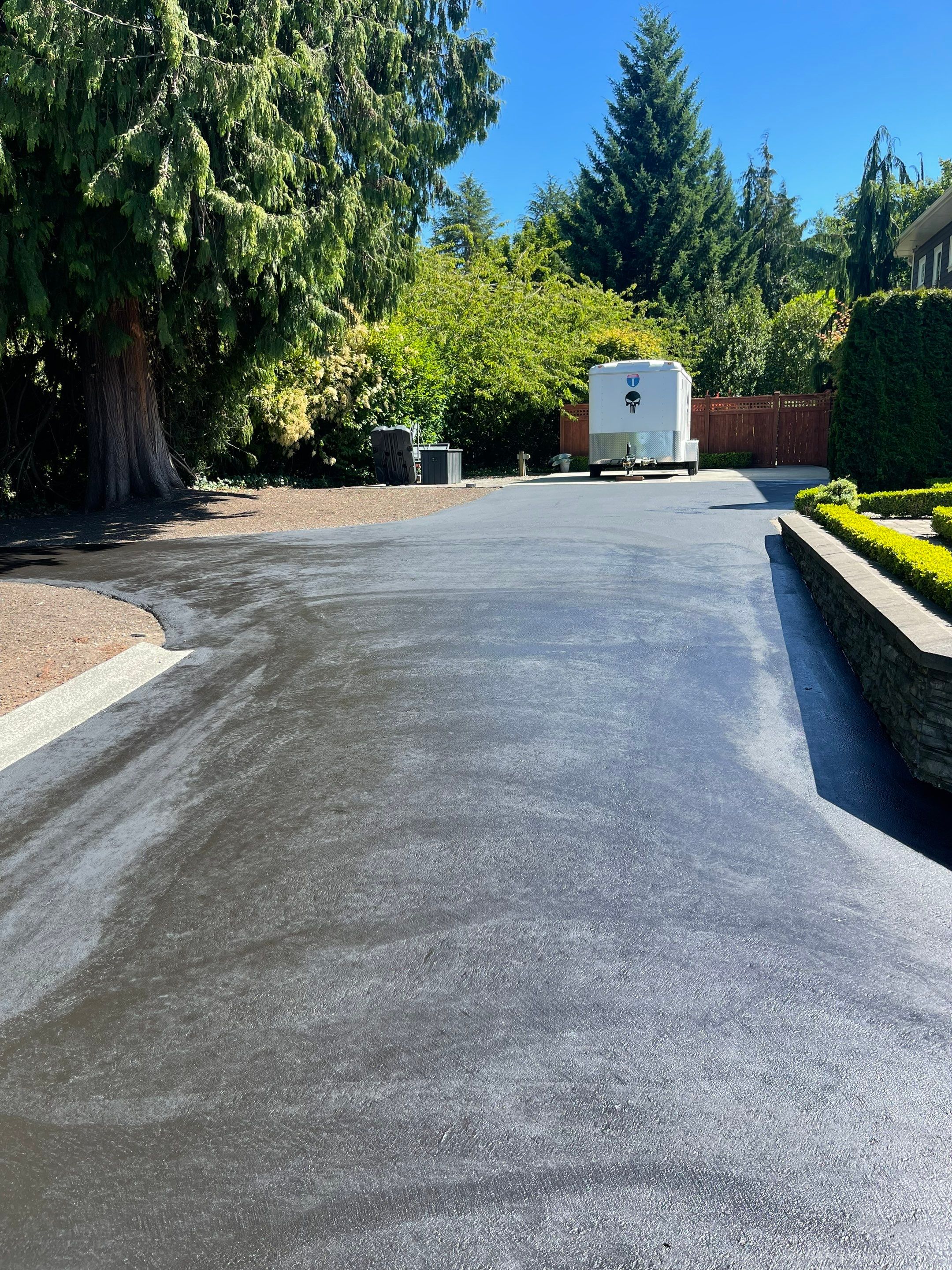 Concrete Driveway Makeover w/ Asphalt Patch | Everett  by Jireh Asphalt & Concrete Inc 