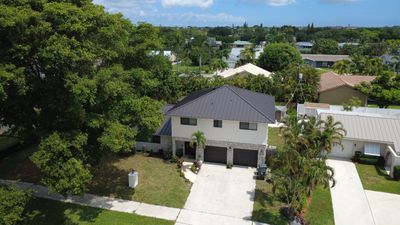 Residential Roofing Installation using 1.5'' Mechanical Seam