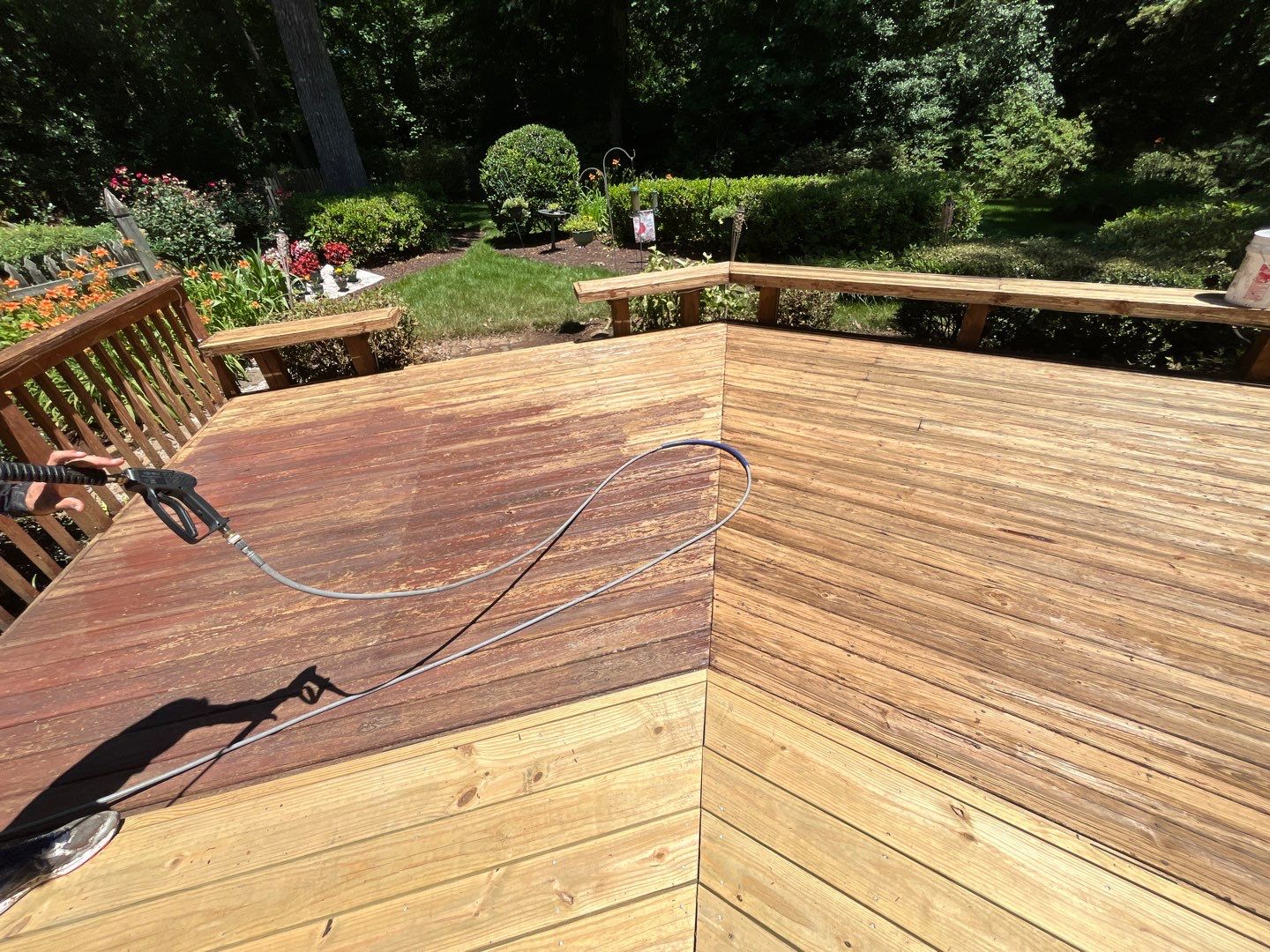Triple deck re-staining by AKK Painting LLC