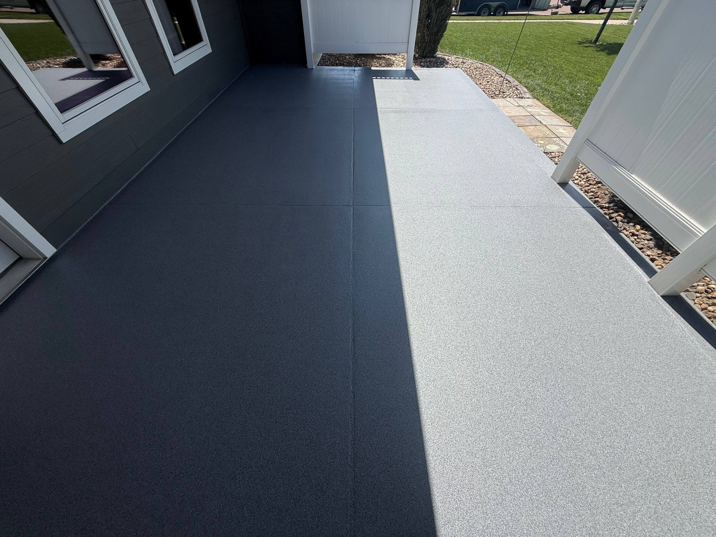 Polyurea Patio Floor Coating in Starry Evening for Sioux Falls Home by Select Painting, Coatings & Garage Cabinets
