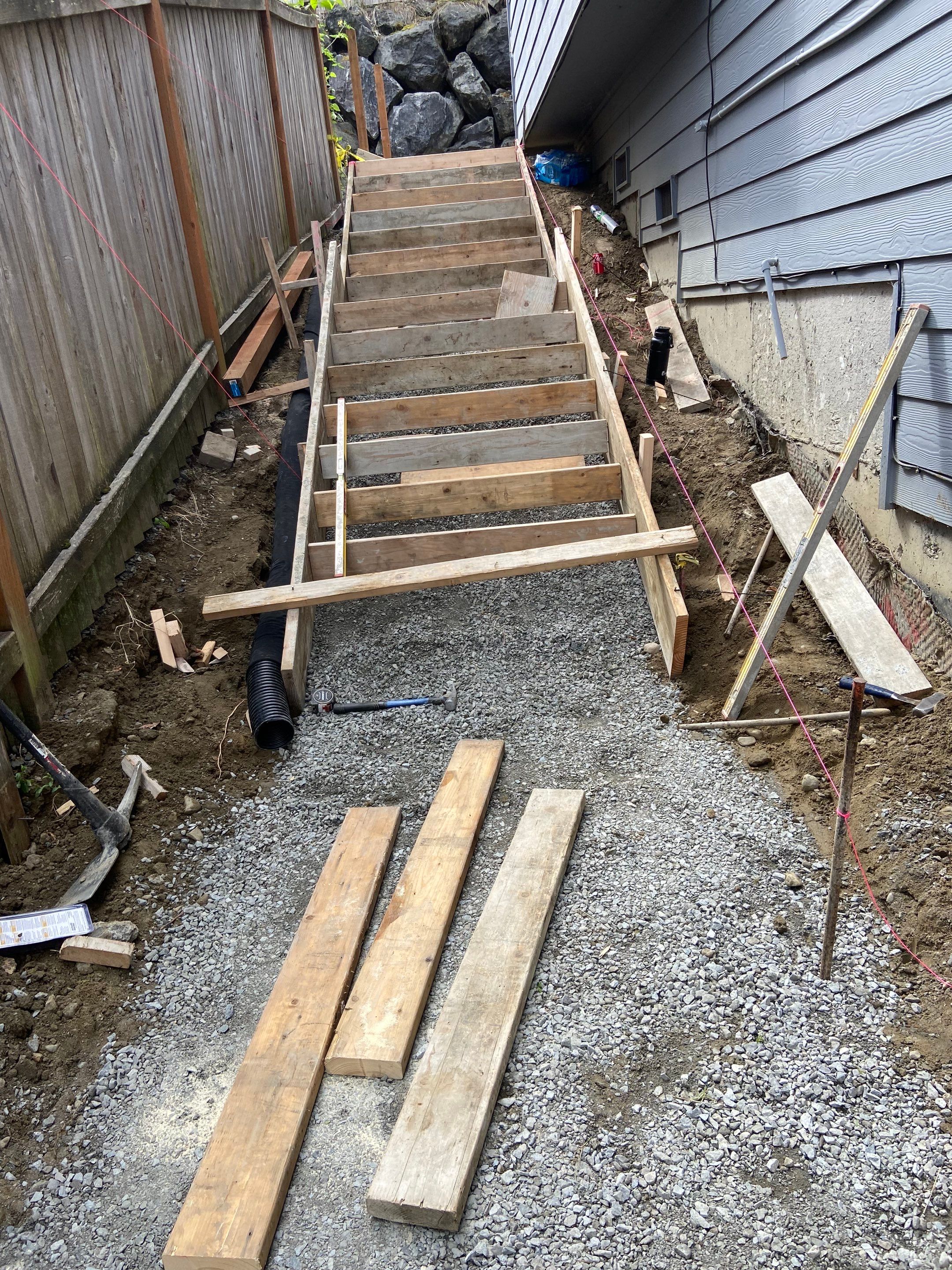 Jireh Outdoor Projects | Concrete Stair Repair and Retaining Wall by Jireh Asphalt & Concrete Inc 