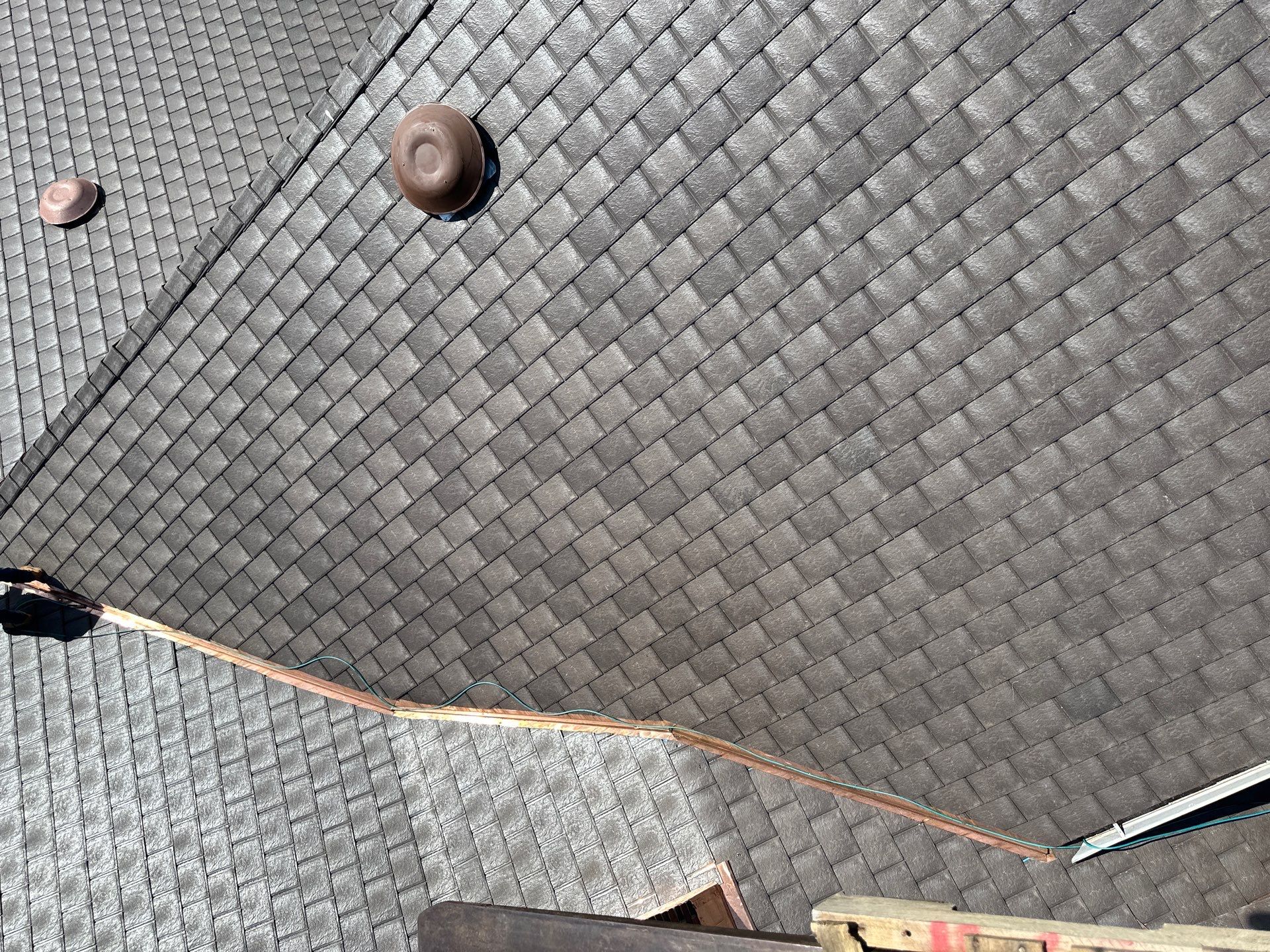 Residential Roofing Installation Using Enviroshake Synthetic Slate by Undersun Roofing 