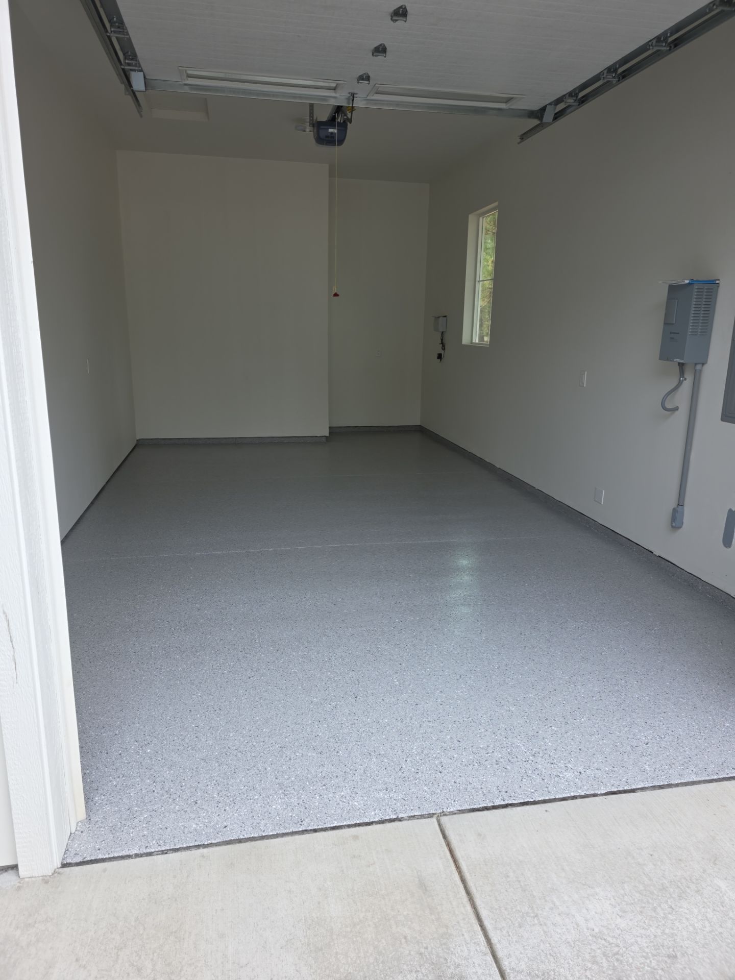 Garage Transformation using Battleship Hybrid by Croc Coatings, LLC
