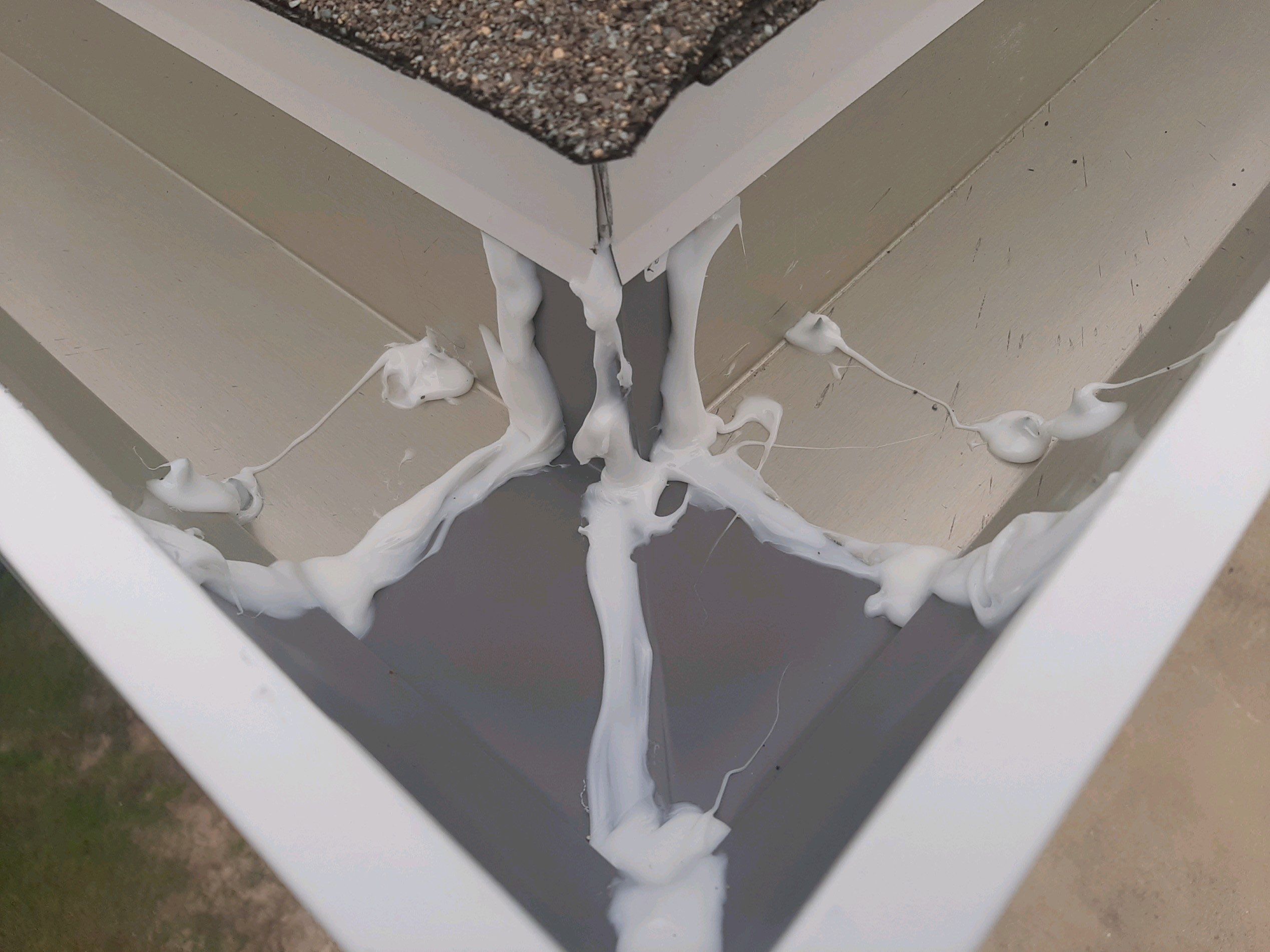Gutter Installation Using White K-Style Seamless Gutters by Gutter Professors
