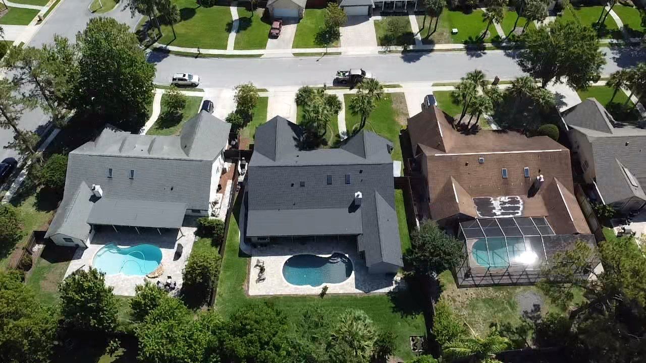 Asphalt Architectural Shingle Roof Replacement and Solar Integration in Longwood by Fortified Roofing Solutions Corp.