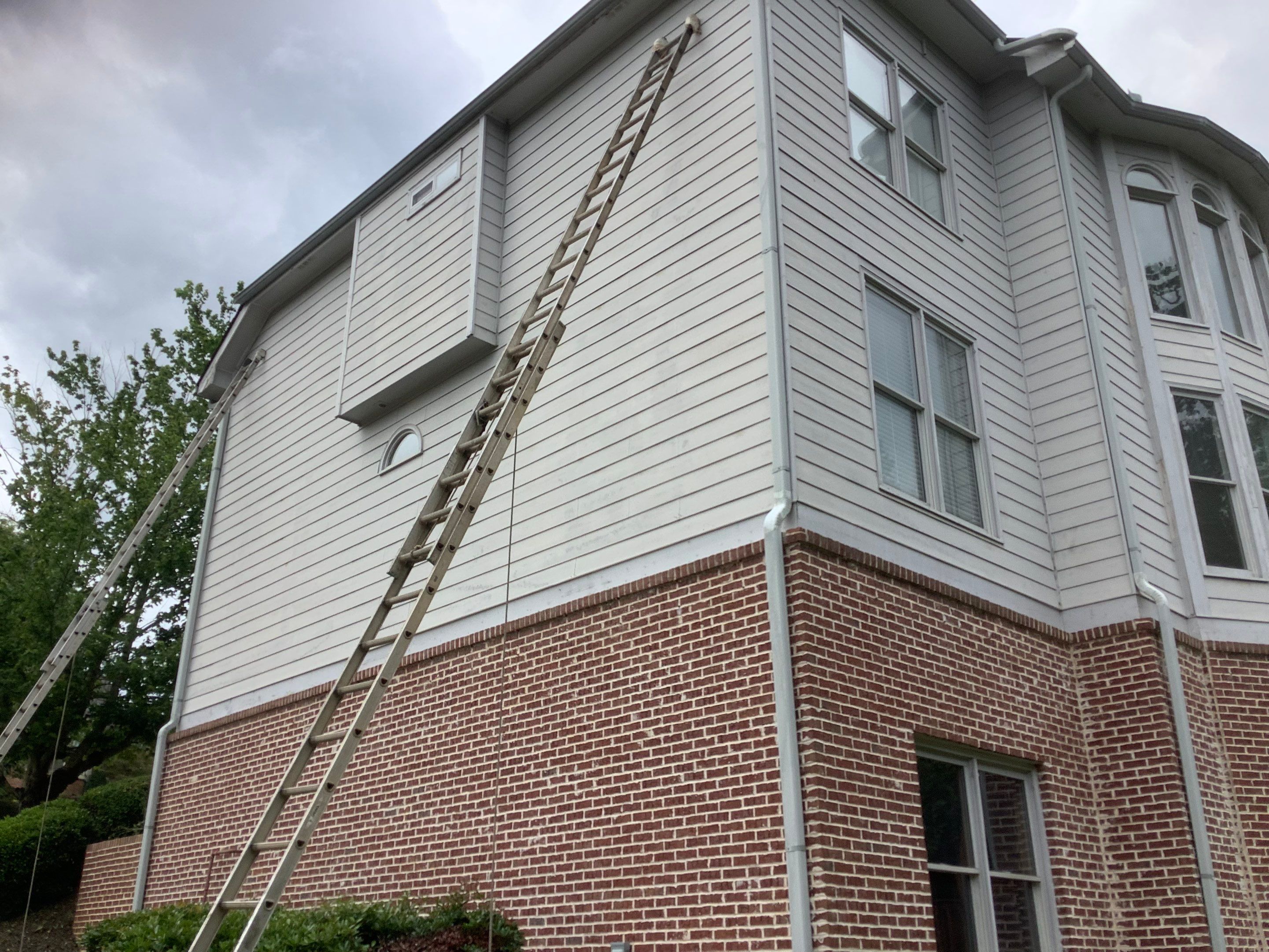 Exterior Painting and Deck Refinishing for Dacula Residential Home by Swift Home Renovations