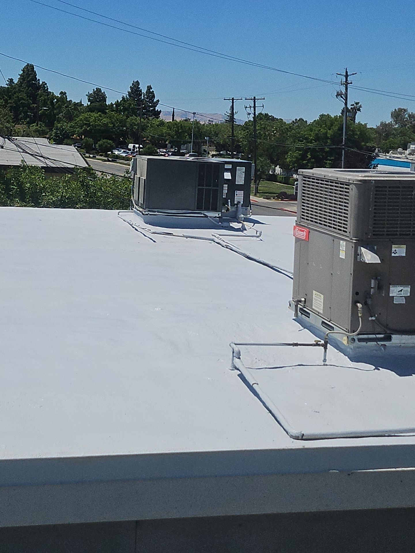 Foam Refurbish using General Coatings acrylic coatings and spray foam by Straight Edge Roofing Inc