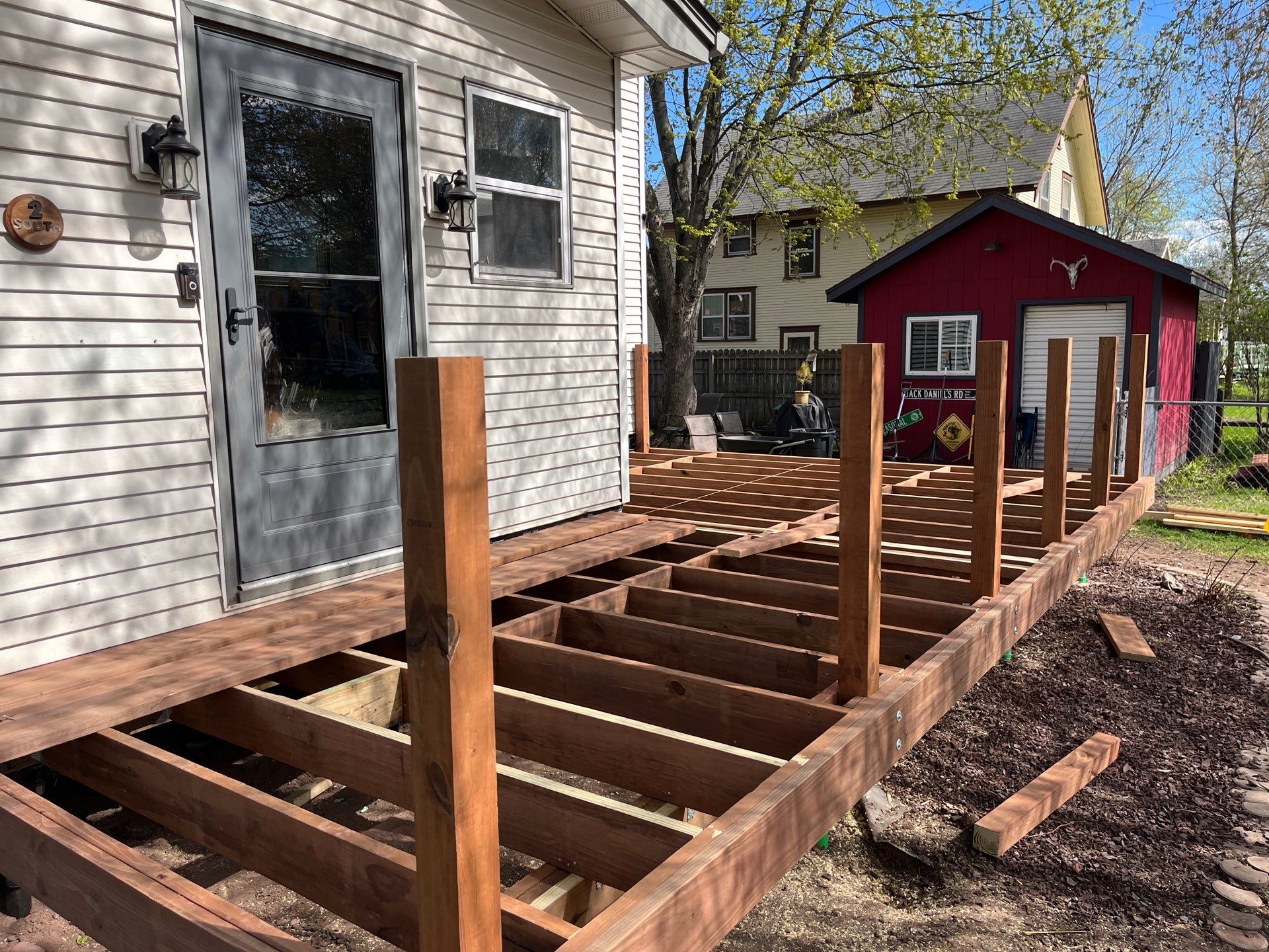 Brown Treated Deck by Anchor North Property Services