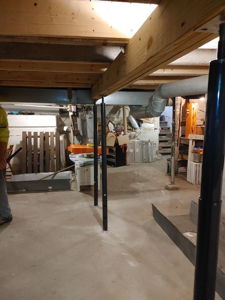 Structural Wood Reinforcement using Structural Wood and Steel Reinforcements (Main Floor Joist) by Toledo Basement Repair
