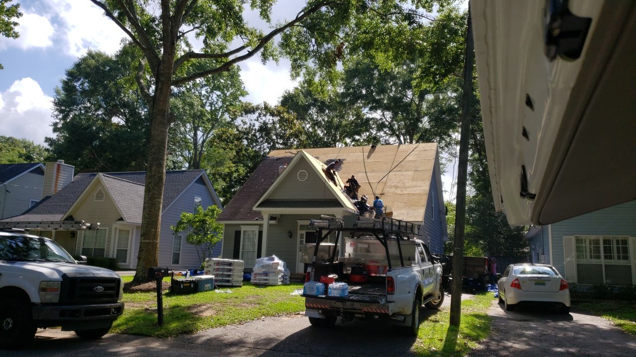Residential Roofing Installation using Roof Replacement by American Roofing & Construction LLC