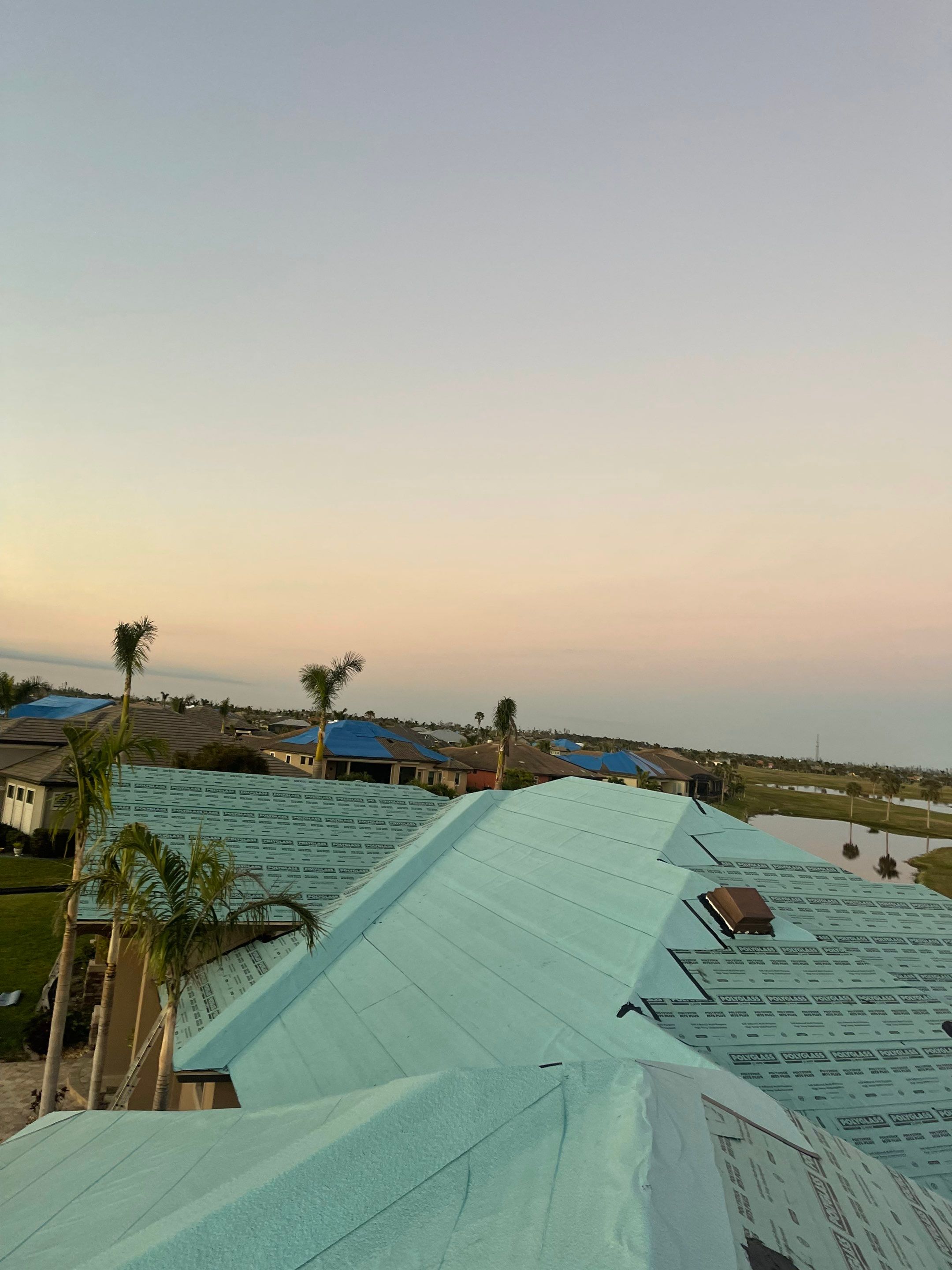 Residential Roofing Installation using Standing Seam Metal Roof in Cape Coral, FL by International Roofing