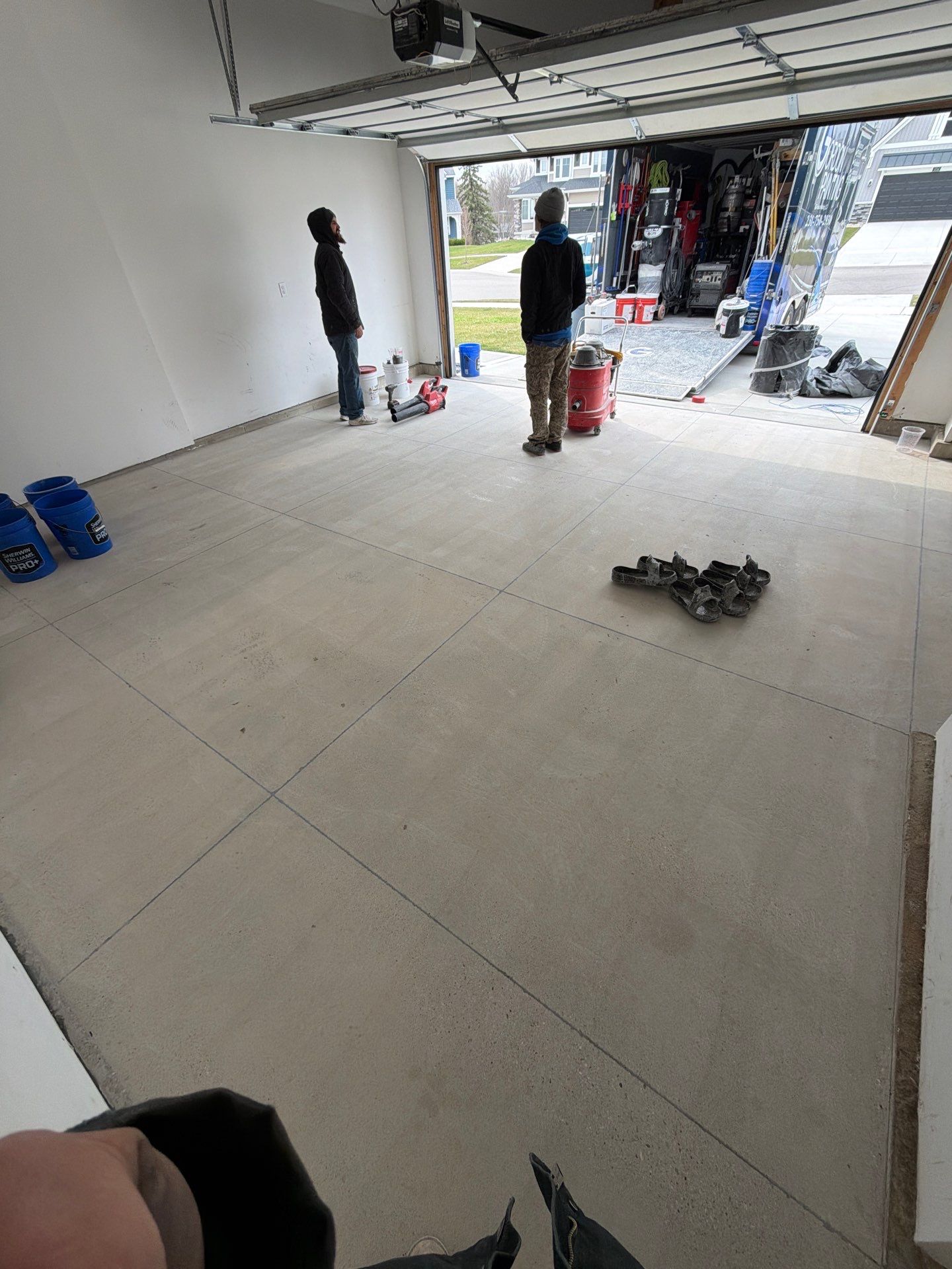 Multi-Car Garage Epoxy Flake Floor Installation in Byron Center by Gordon Painting
