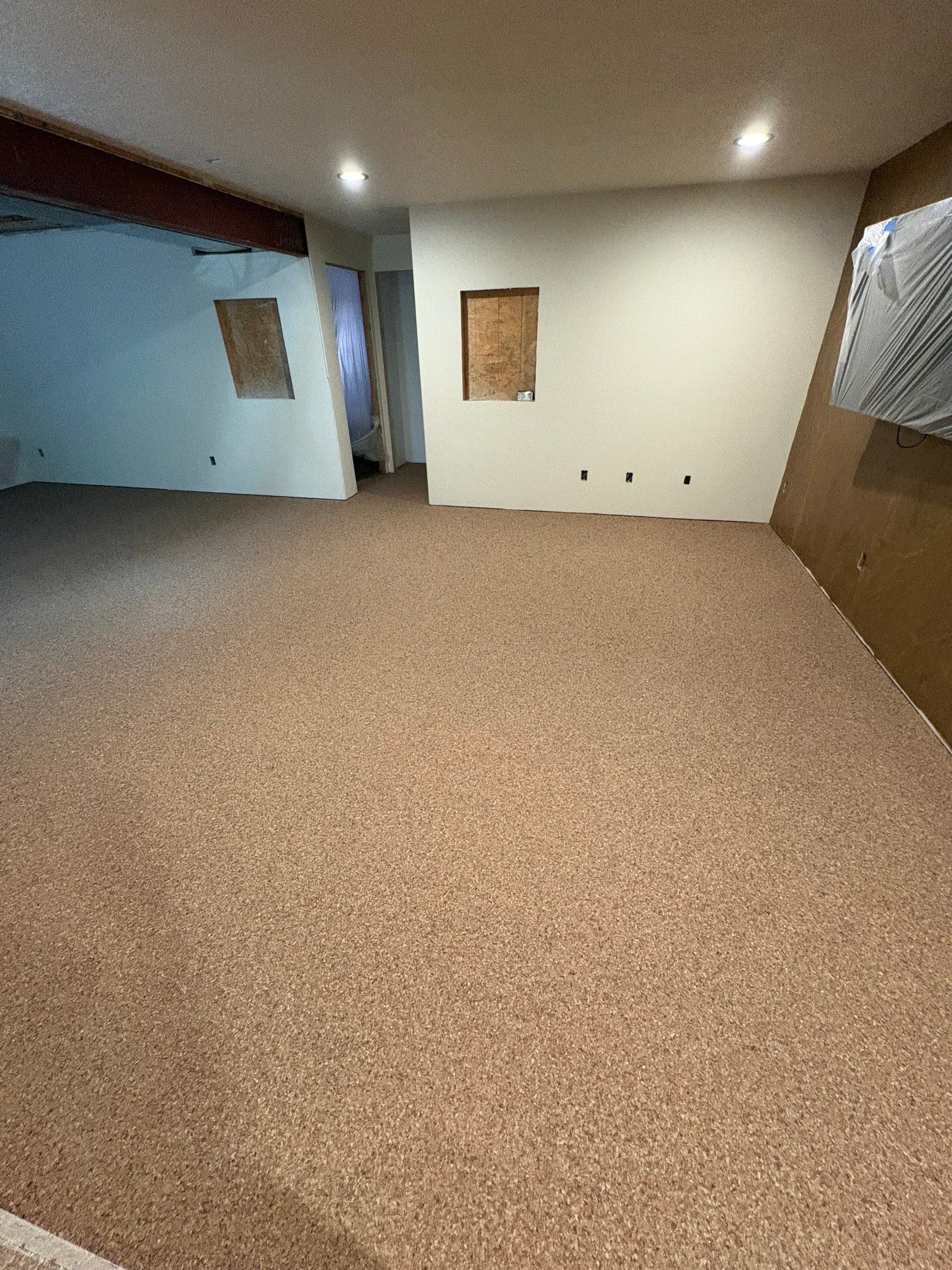Custom Chip Concrete Coating for Colman Basement and Garage by Select Painting, Coatings & Garage Cabinets