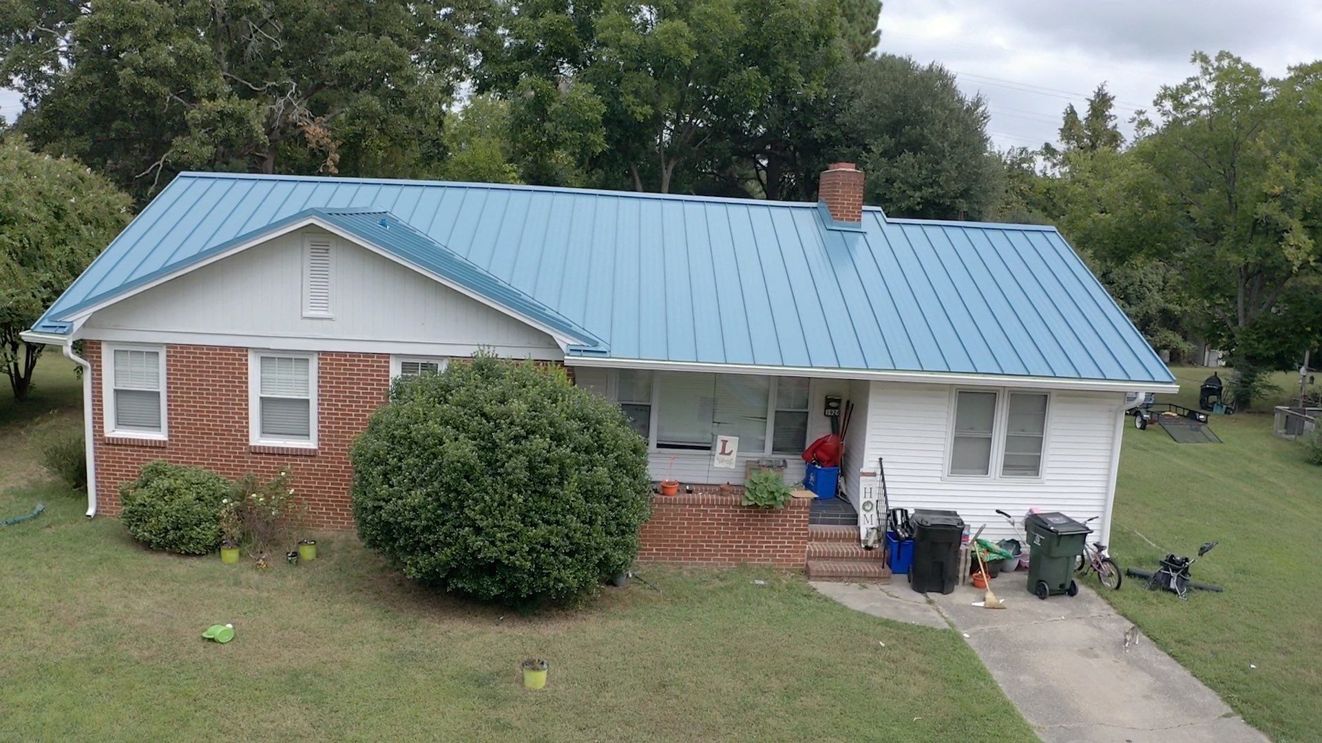 Carolina Blue Standing Seam Roof by Just In Time Roofing and Restoration