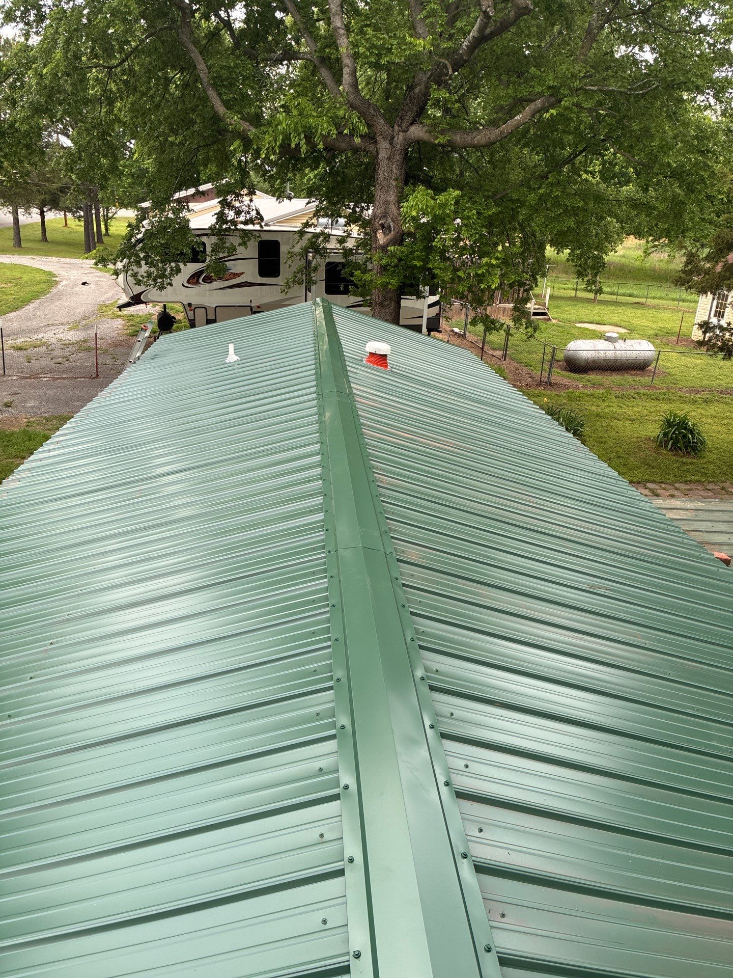 Metal roof installation by In & Out Construction & Remodeling, LLC