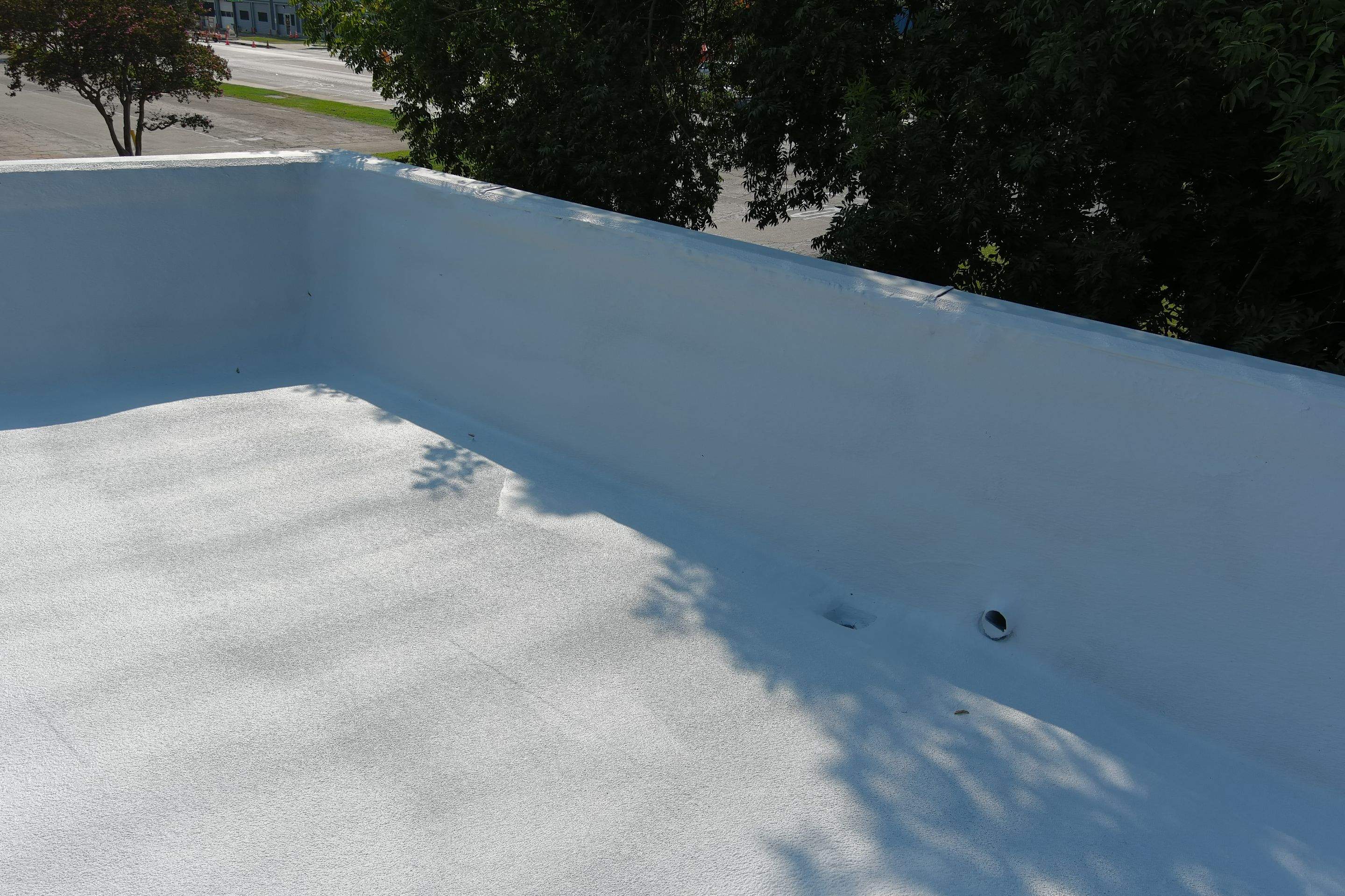 Commercial Roofing Installation using General Coatings acrylic coatings and spray foam by Straight Edge Roofing Inc
