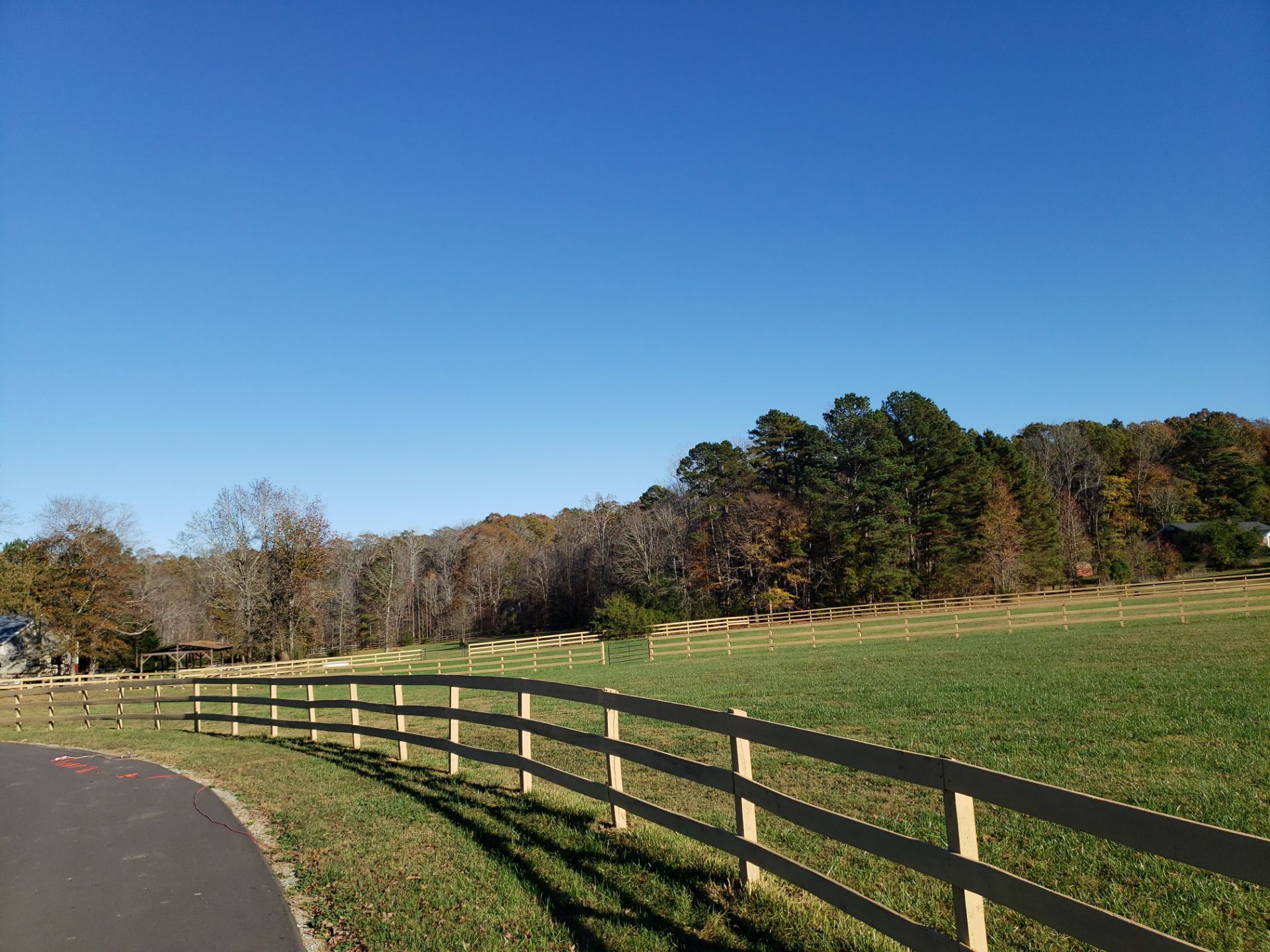 Fence Staining (Farm in Durham NC) by GonzalezPainters & Contractors Inc 