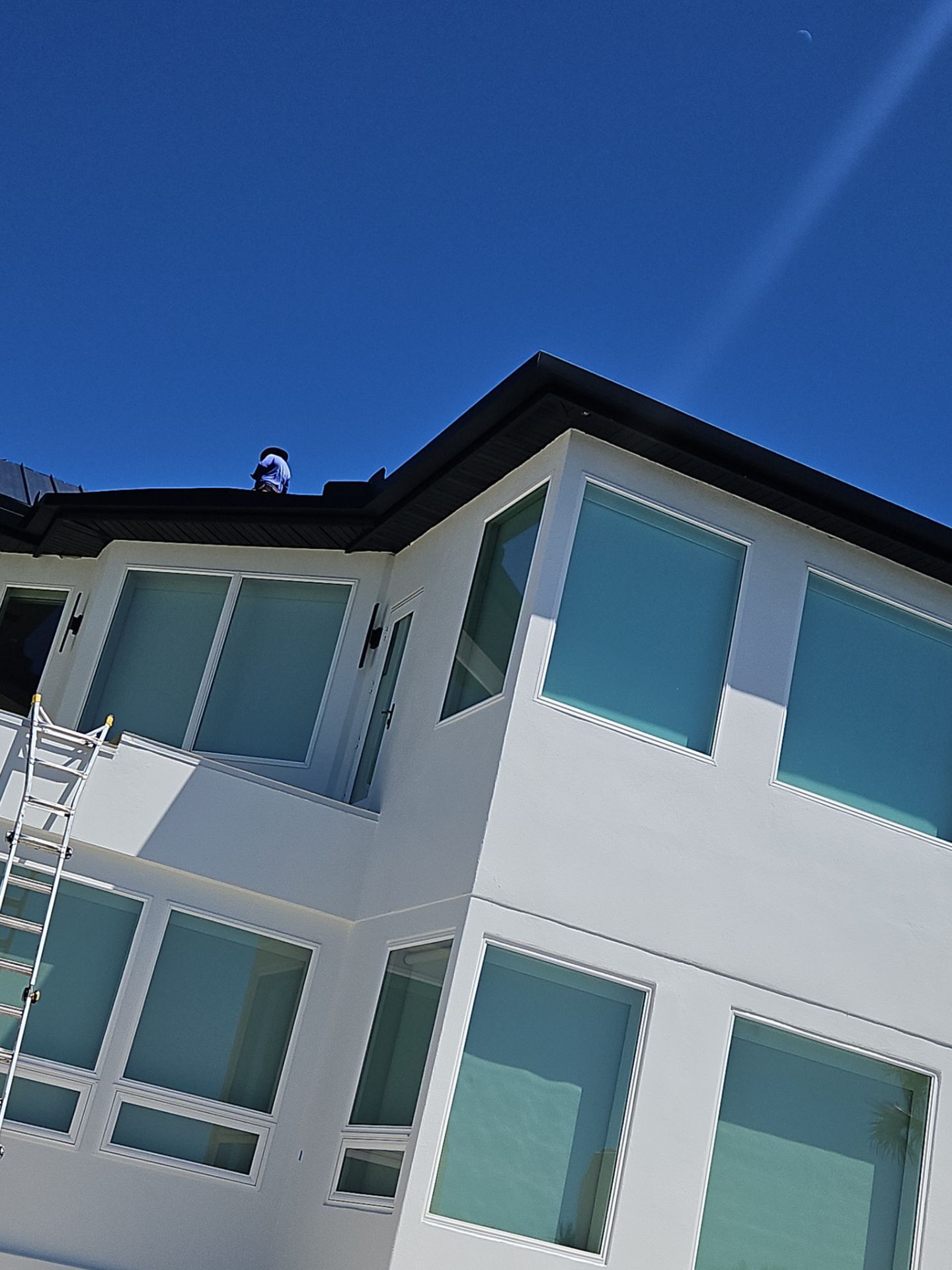 Soffit and Fascia Installation and black seamless gutters in Sarasota FL by Gutter Professors