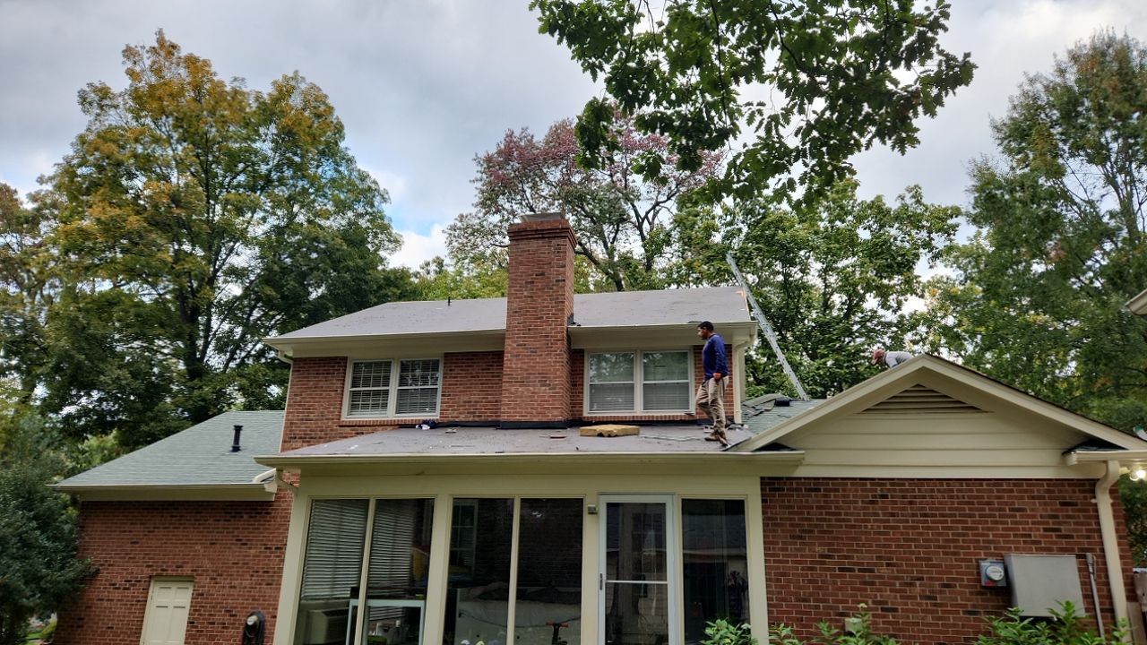 New Roof with Solar Panels by Just In Time Roofing and Restoration