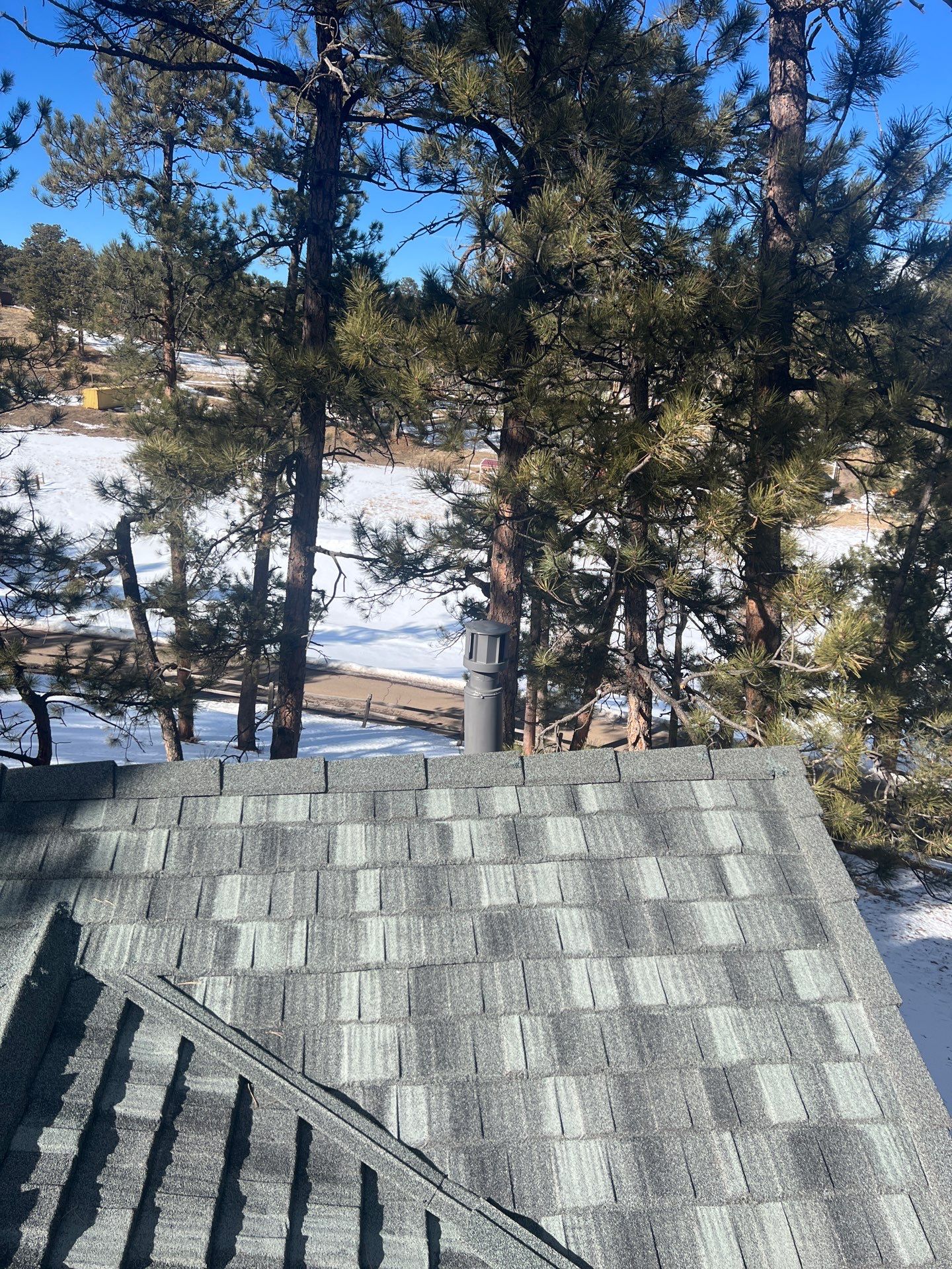 Residential Roofing Installation using Stone Coated Steel by Blue Peaks Roofing LLC 