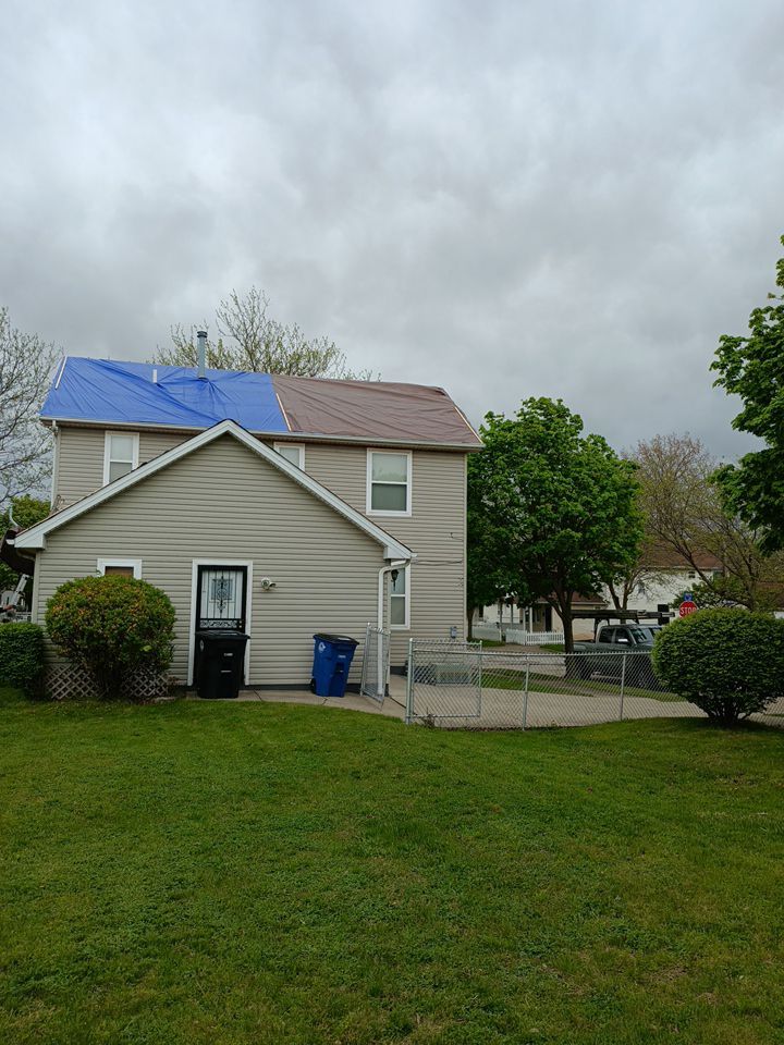 EMERGENCY TARPING ROOF BEFORE STORM using TARP by Absolute Roofing and Construction