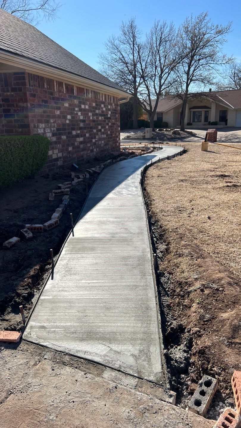 Concrete sidewalk using Concrete by Clays Services Inc