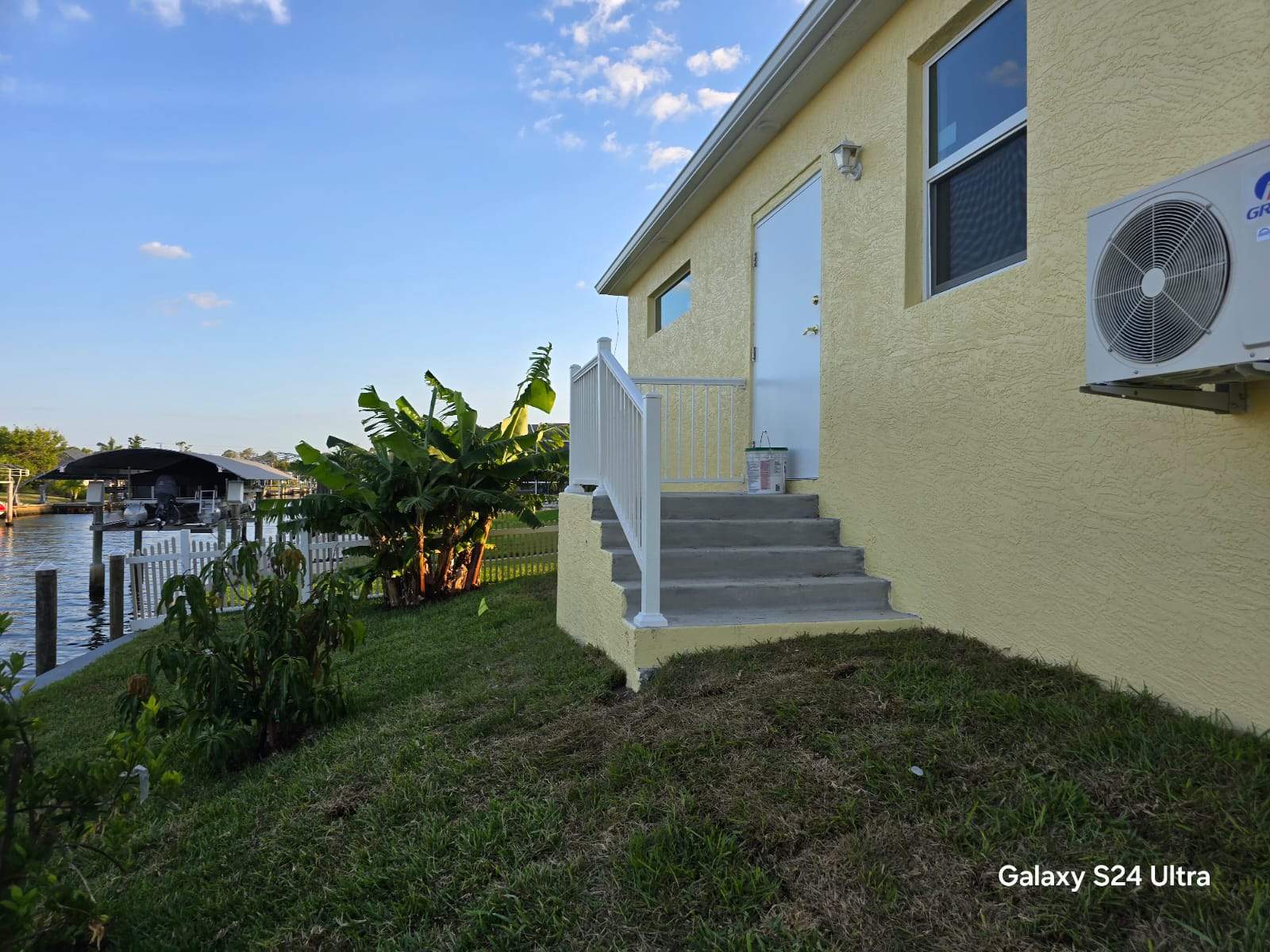 Vinyl Privacy Fence and Porch Railing Installation in Port Charlotte by True Fence LLC