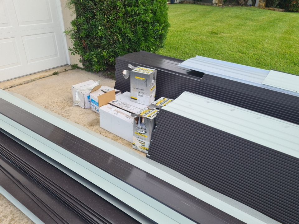 Residential Roofing Installation using 1" Nail strip metal roof by BLUES BROTHERS ROOFING