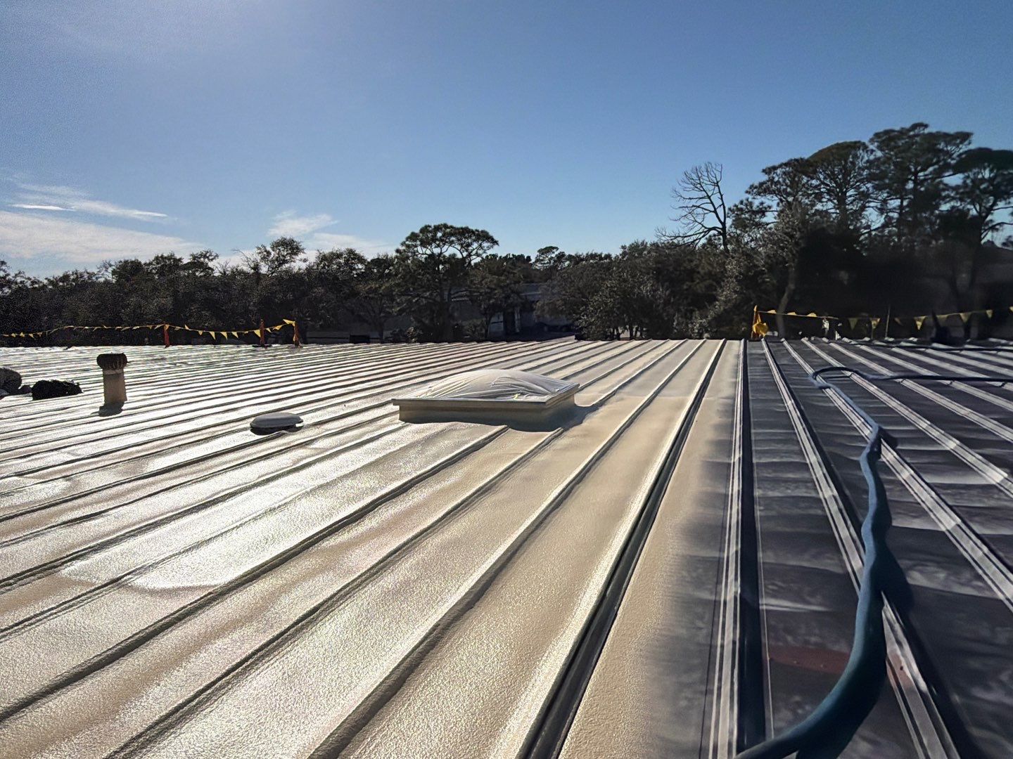 Sarasota Industrial Warehouse Metal Roof Silicone Coating Restoration by CES Roofing