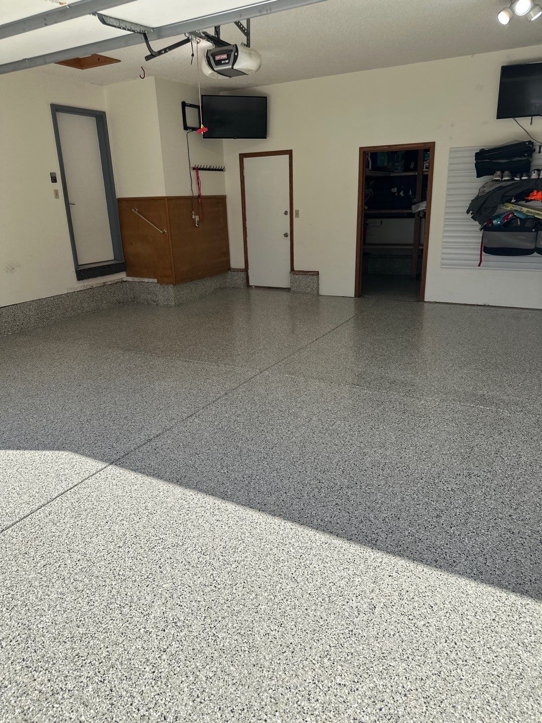 Two-Stall Epoxy Garage Floor Coating and Repair in Lincoln by Goat Coatings