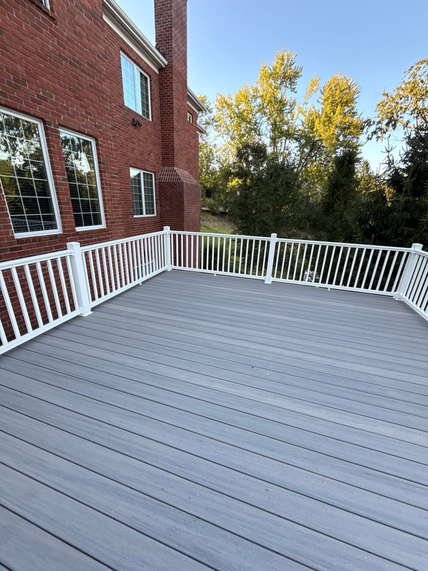 Deck extension  by Cousins Roofing Siding & Decks