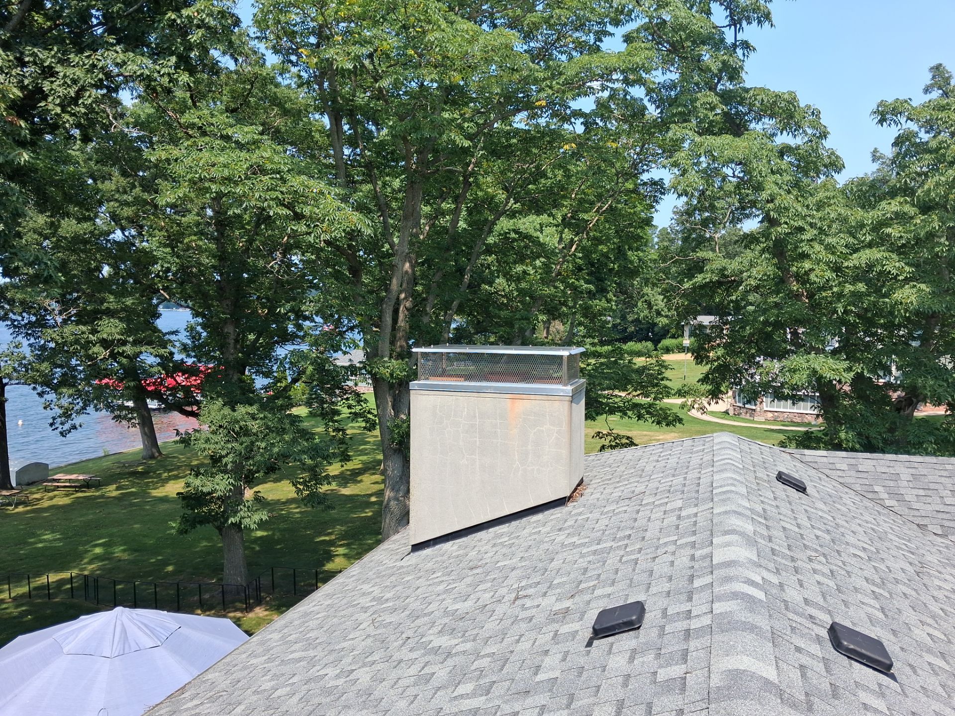 Custom Multi-flue Cap Replacement: Solving a Venting Issue by Leonard and Sons Building Services, Inc.