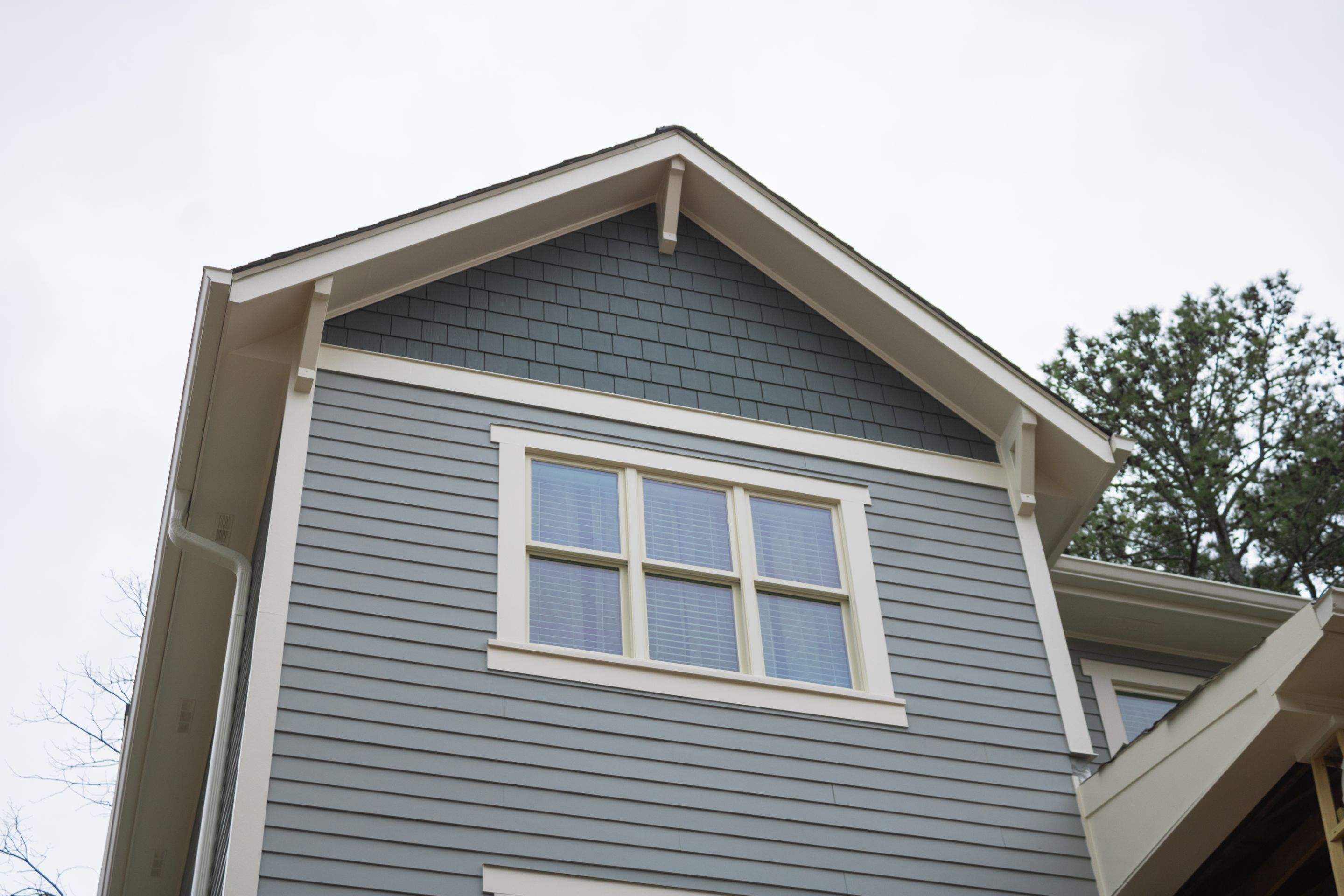 James Hardie Siding Replacement, Exterior Painting, Deck Stain, and Gutter Installation in Peachtree Corners, GA by Nelson Exteriors