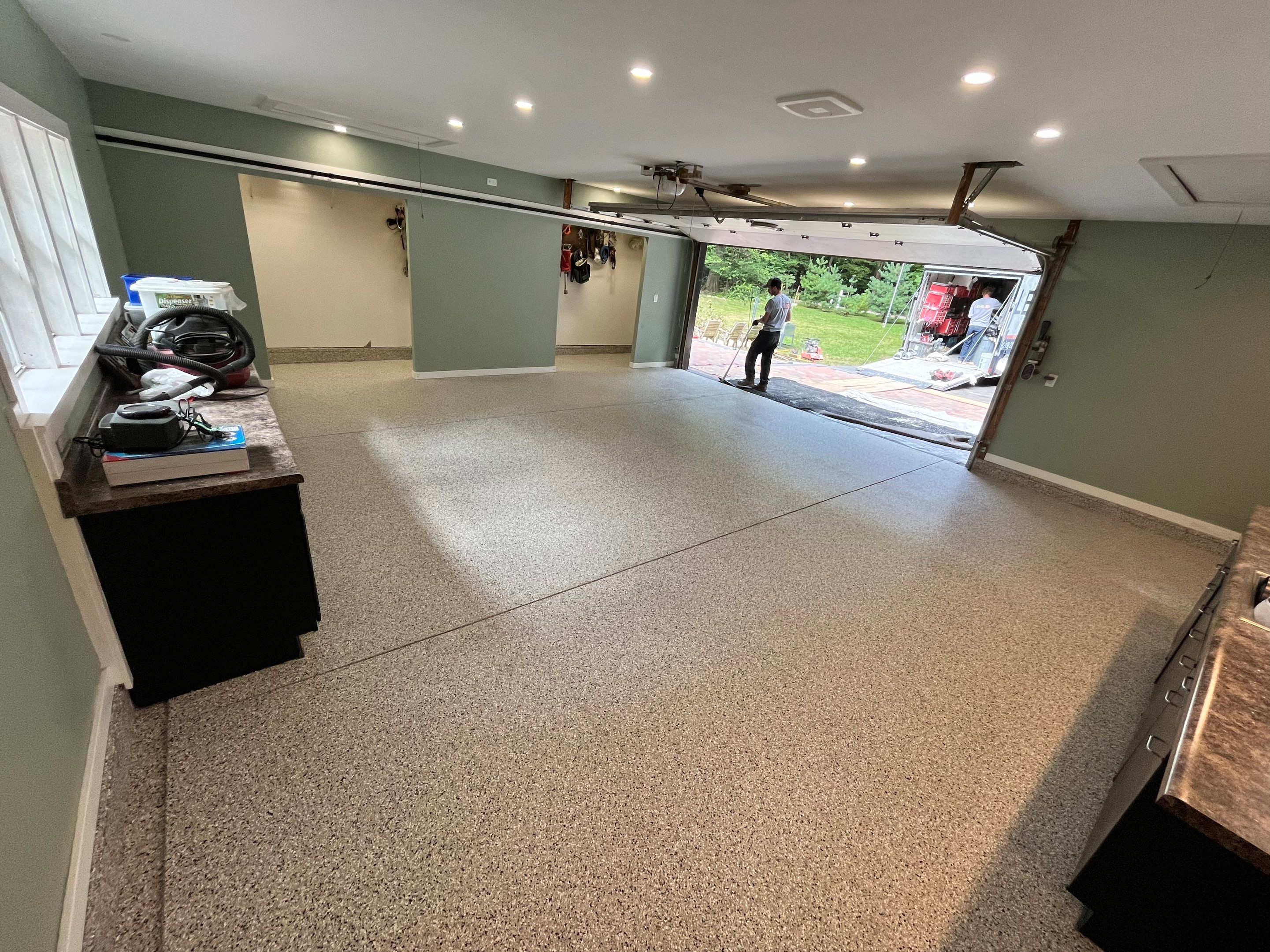 Cabin Fever Flake Garage Floor  by Level 10 Coatings