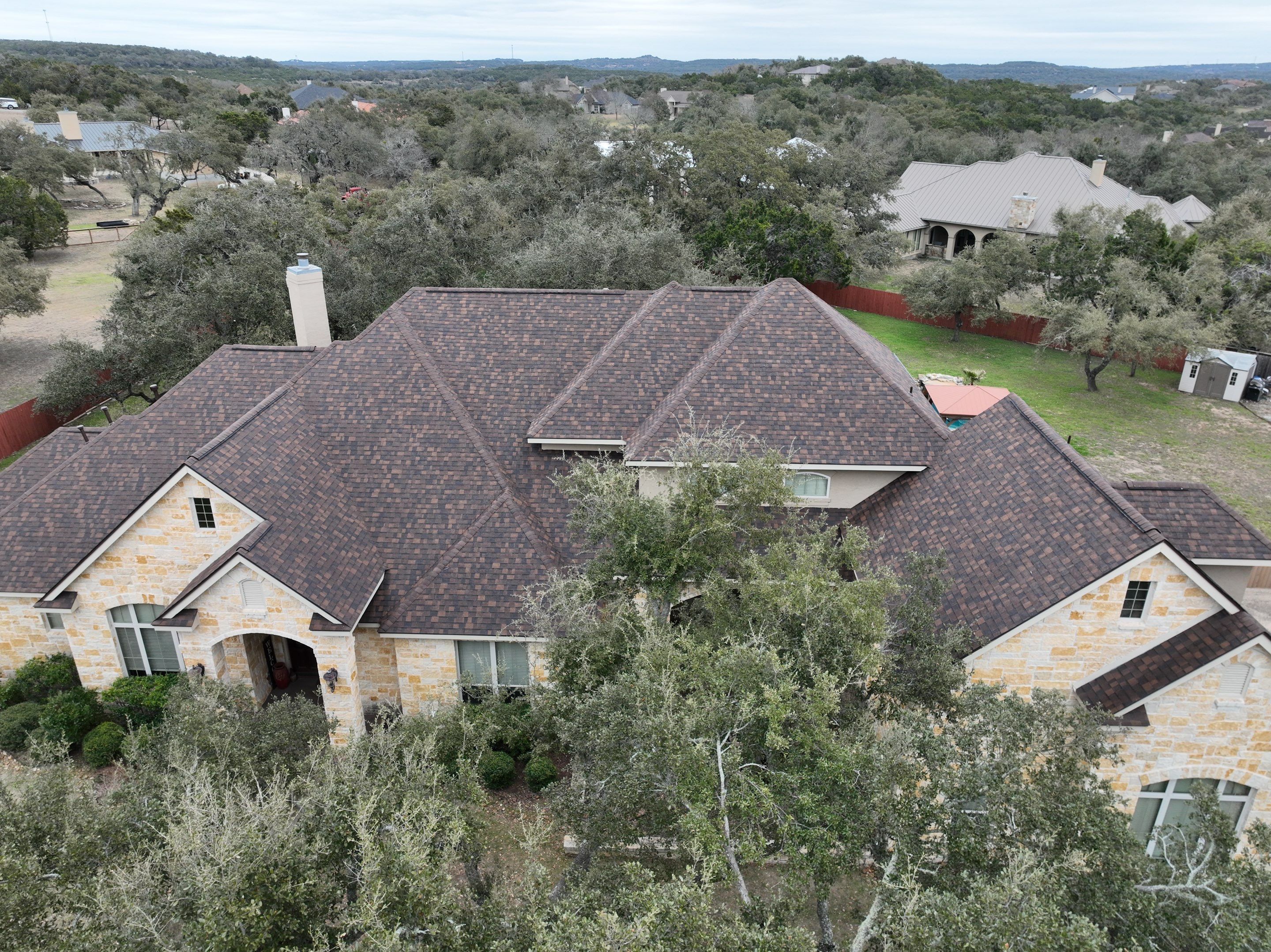 Residential Roof Replacement using 30 Year Laminate Shingles with High Profile Ridge by Premier Roofing and Contracting
