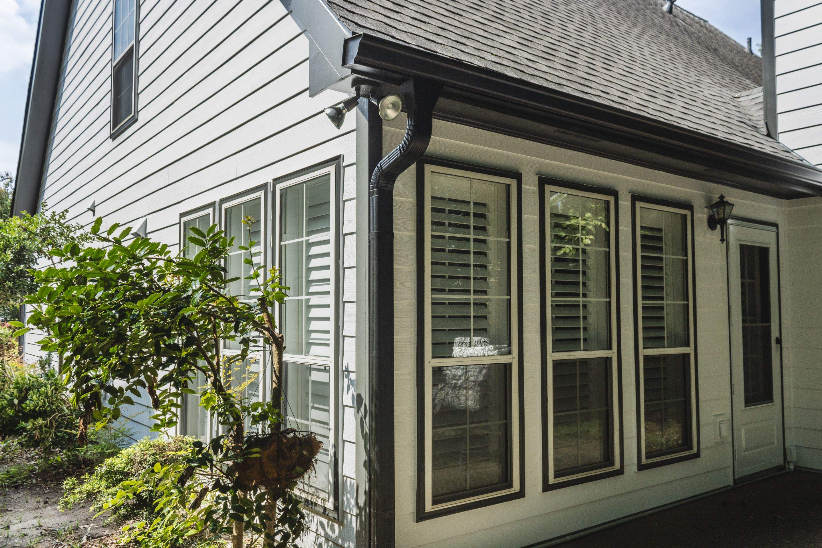 Alpharetta, GA Siding & Exterior Painting with Black Trim Before & After by Nelson Exteriors