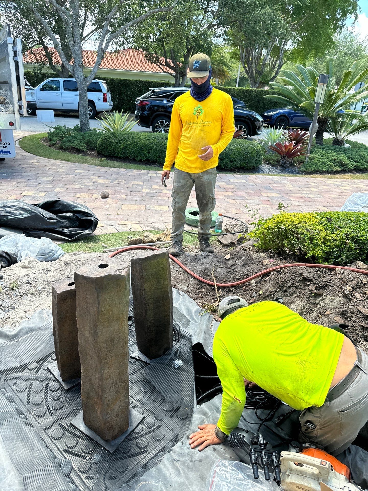 Pinecrest Fountain at Door Entrance by Nature's Dream Landscape and Tree Service