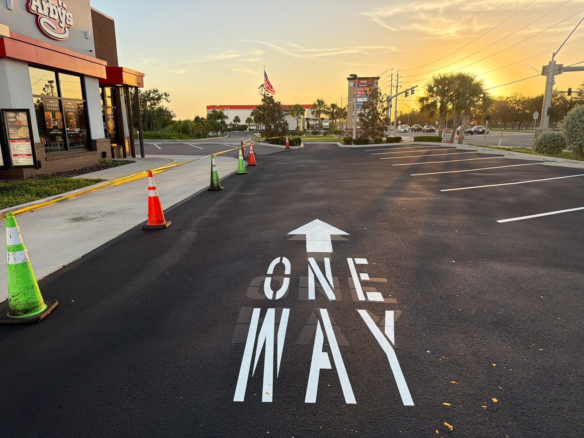 Commercial Asphalt Sealcoating and Line Striping at School House Plaza by Everline Coatings & Services - Southwest FL