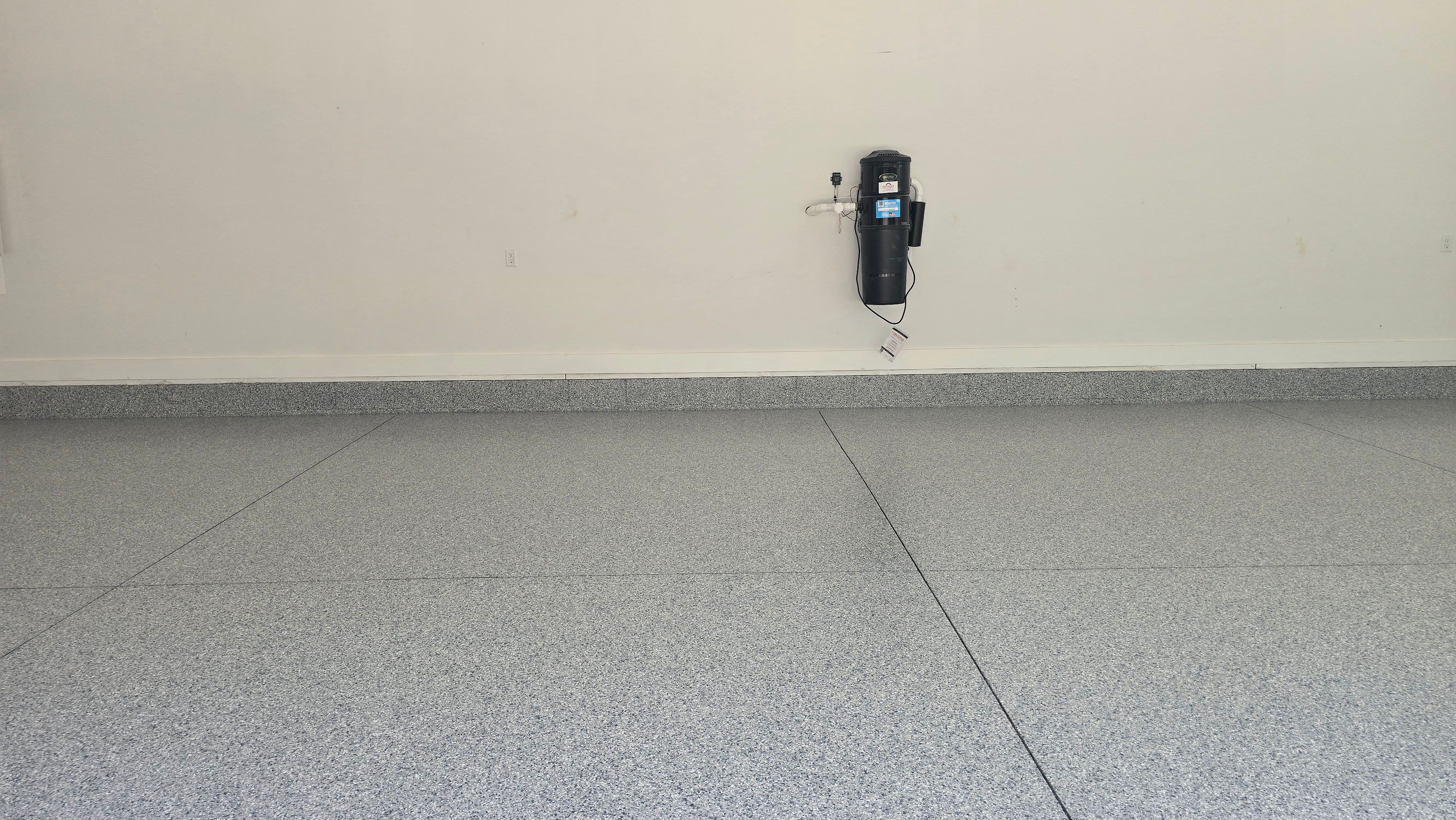 Porch & Garage Using Tidal Wave & Gravel  by Elite Floor Solutions