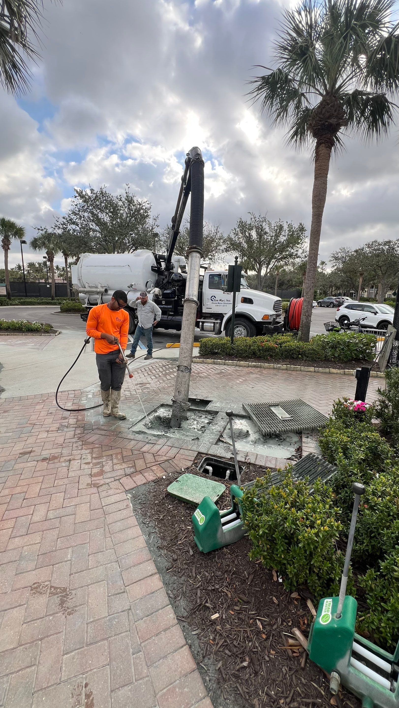 Pelican Landing Tennis Court Catch Basin Cleaning by APS Power & Water