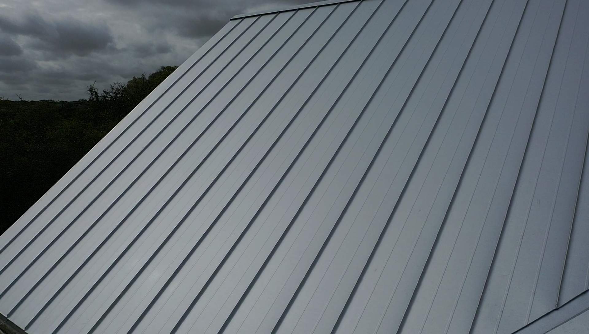 Residential Metal Roof Installation using McElroy Metal by Premier Roofing and Contracting