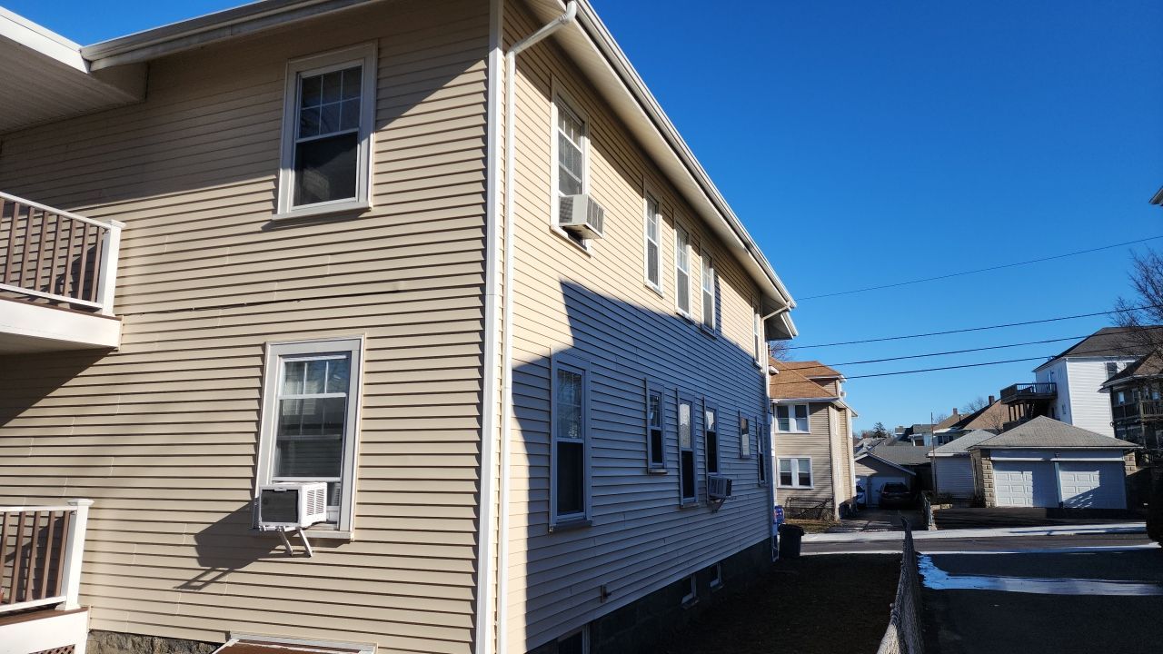 Layover siding project in. Quincy, MA by UBrothers Construction